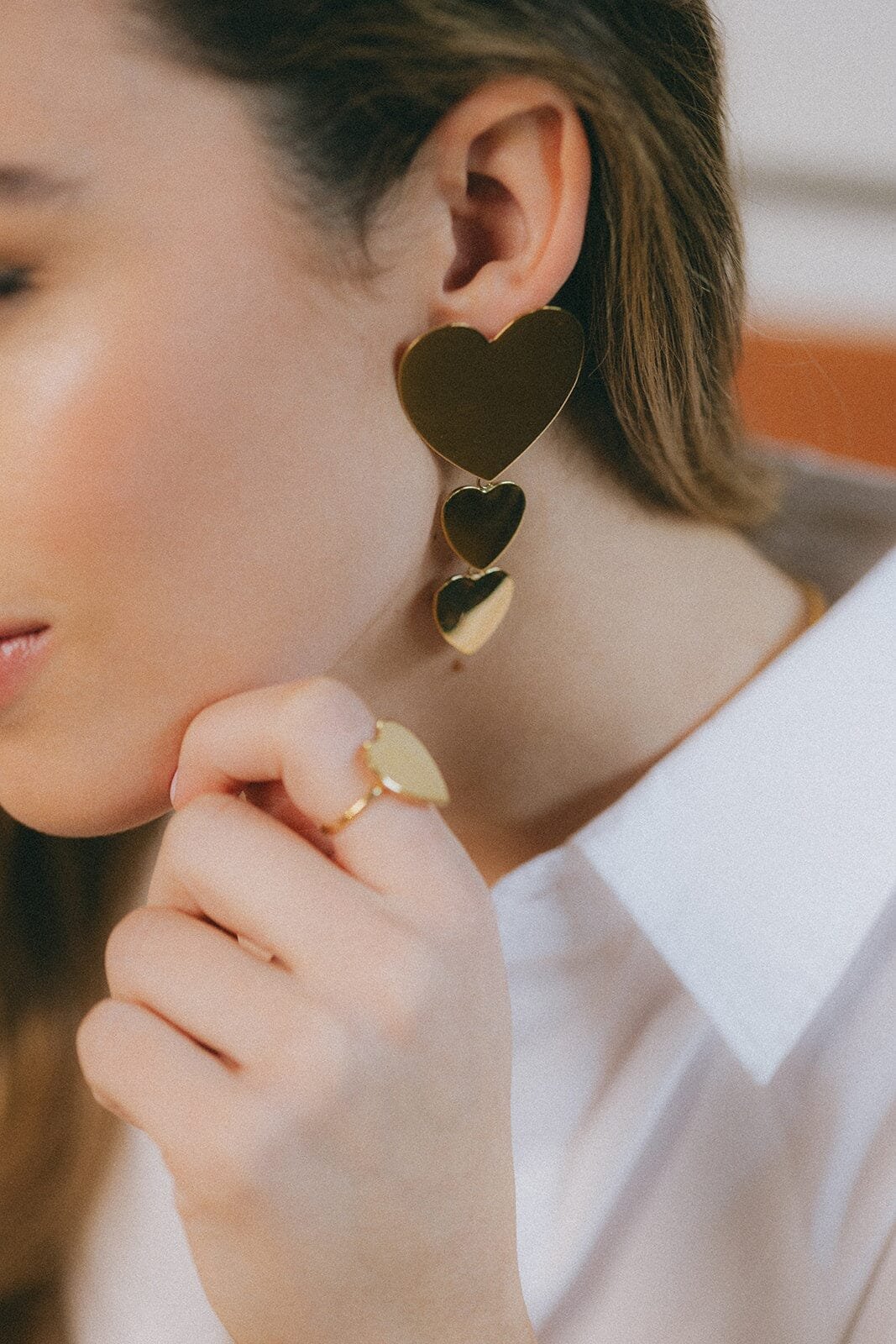 Dangling heart-shaped gold-plated stud earrings Golden