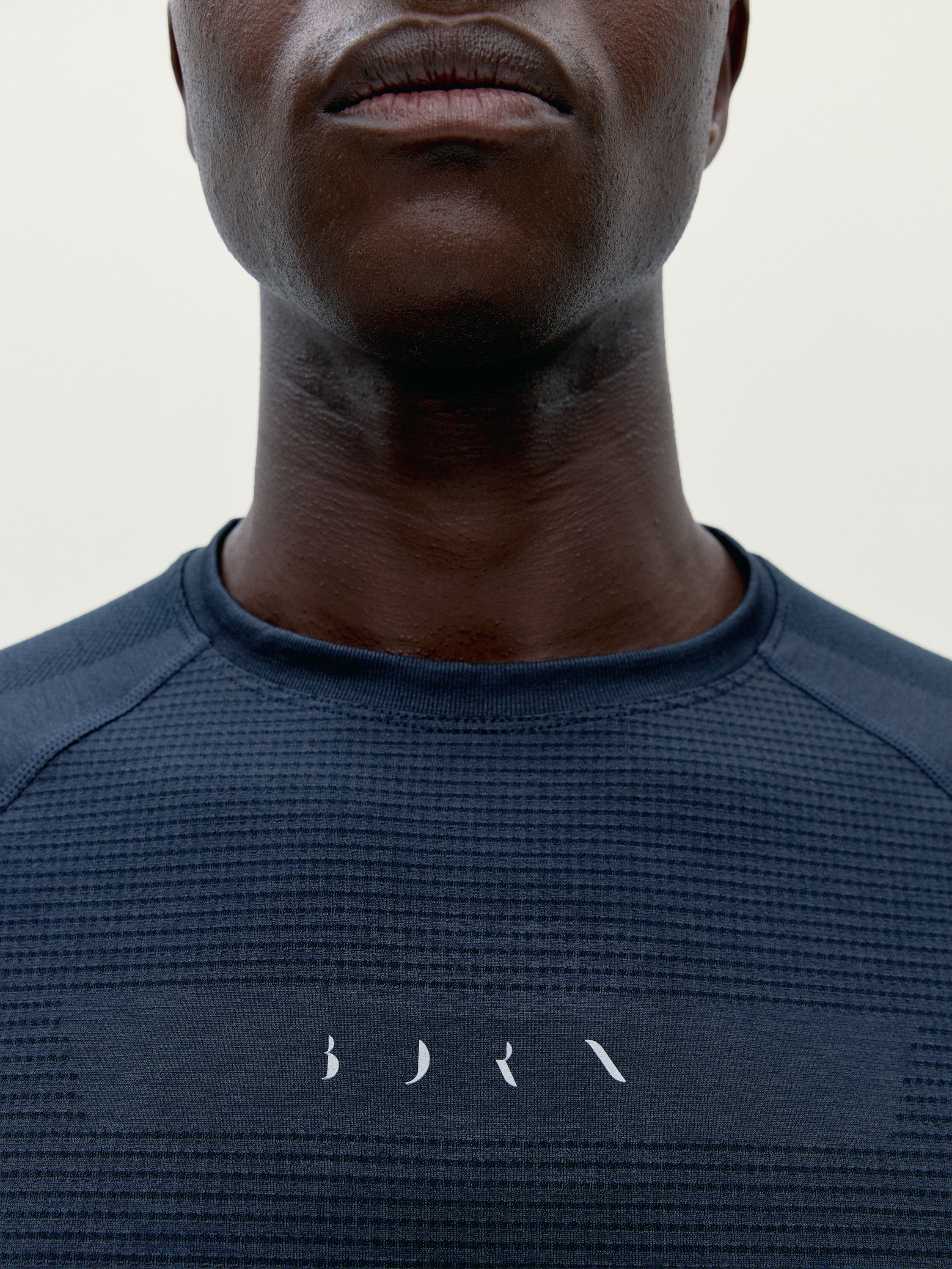 Men's sports T-shirt with short sleeves and reflective details BORN Grey