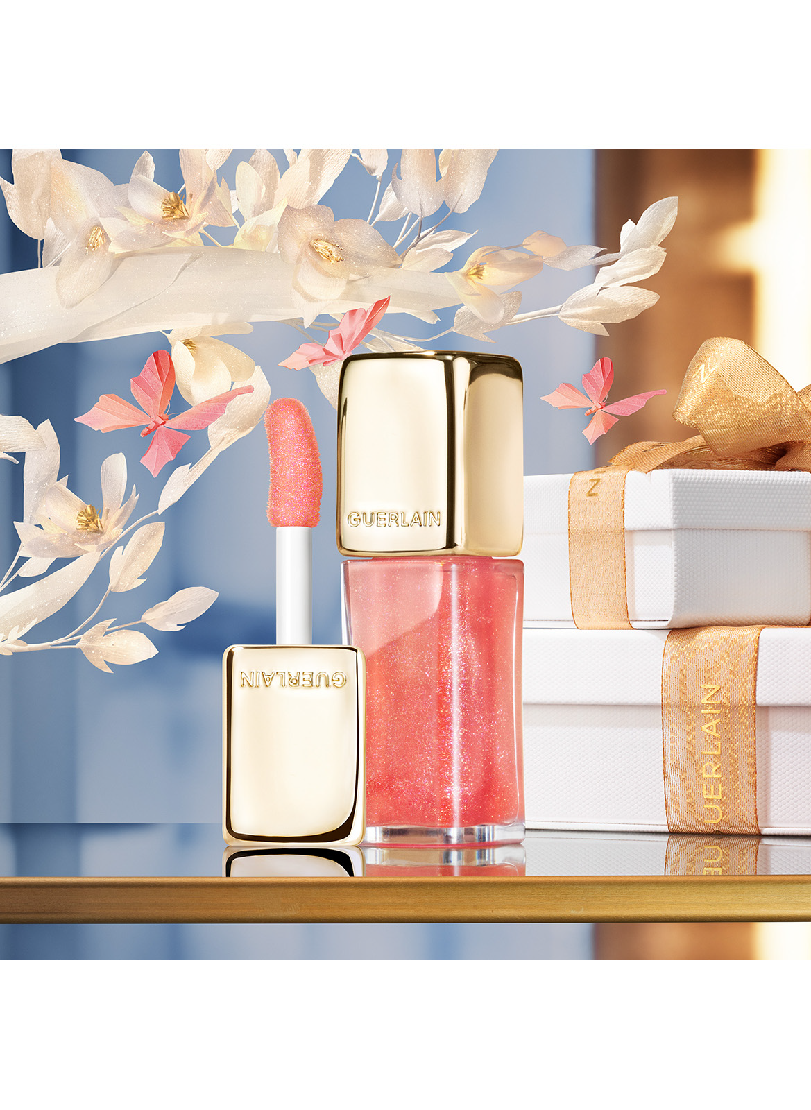 KissKiss Bee Glow Oil - Huile à lèvres teintée au miel 92% d’origine naturelle GUERLAIN 389 sparkling peach