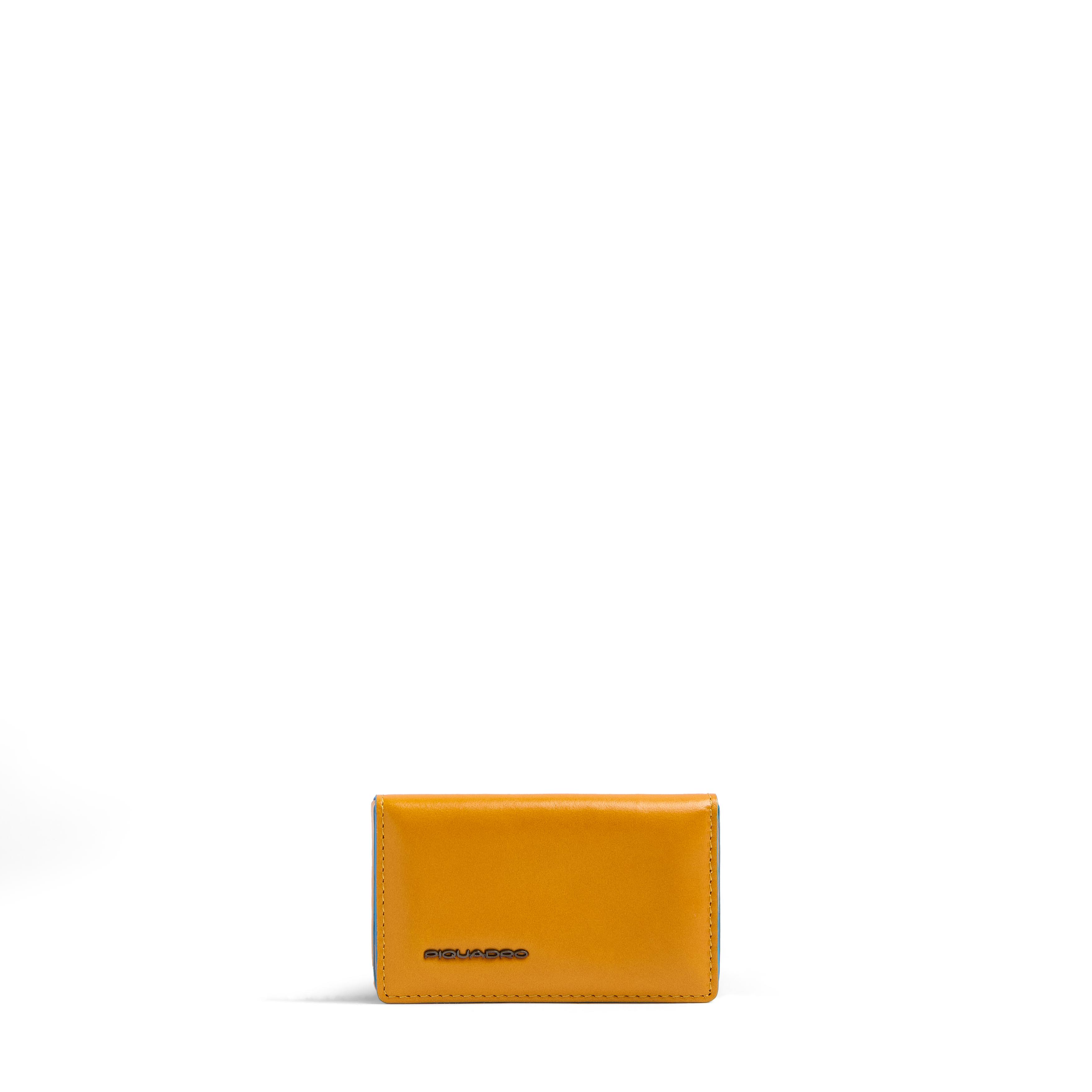 - 100% leather, - 6 cardholder slots, - 1 central compartment, - Size: L10 x H7 cm. PIQUADRO Yellow