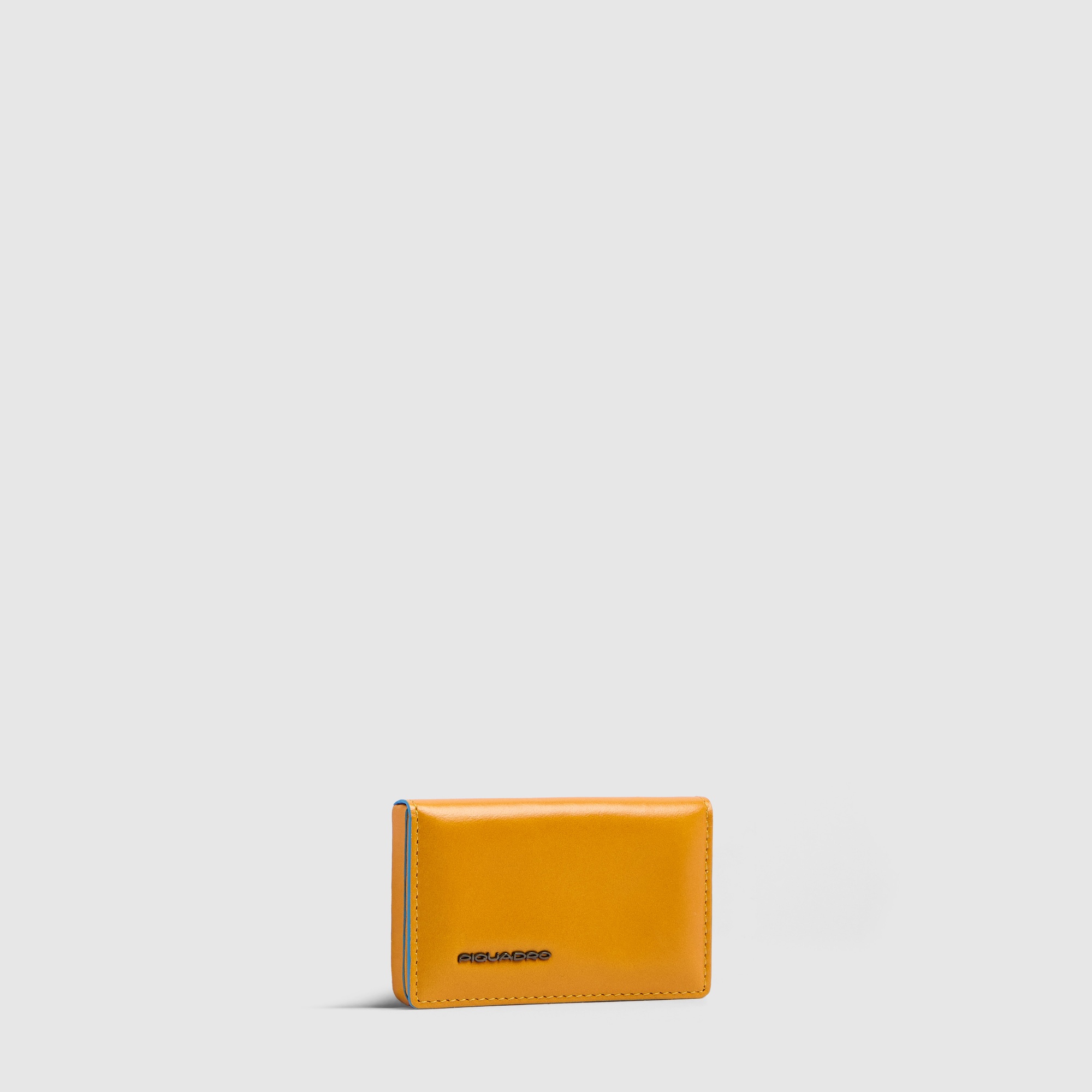 - 100% leather, - 6 cardholder slots, - 1 central compartment, - Size: L10 x H7 cm. PIQUADRO Yellow