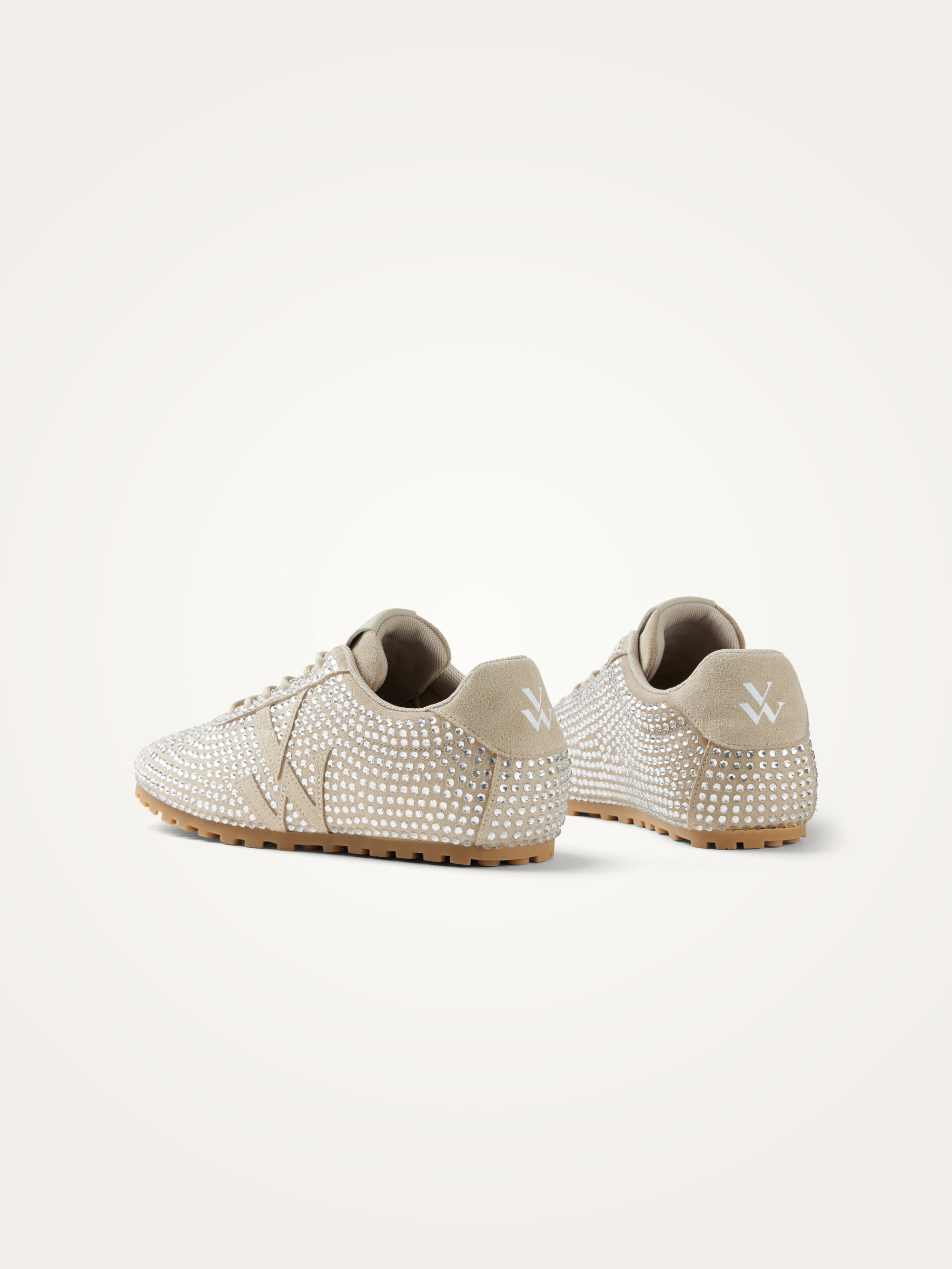 Monogram-embellished sneakers adorned with rhinestones on a serrated thin sole. VANESSA WU Beige
