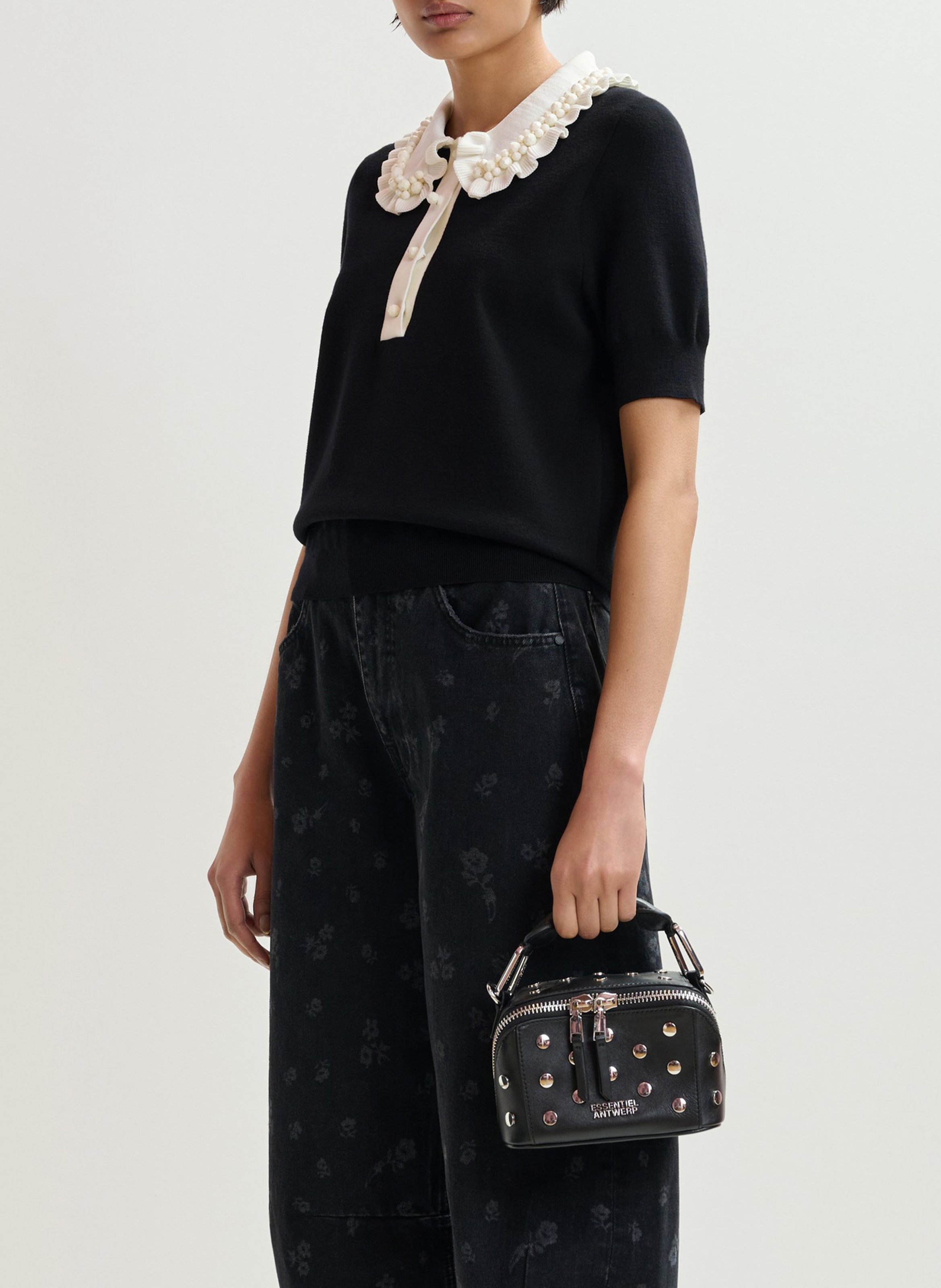 Short-sleeved plain polo with ruffles ESSENTIEL ANTWERP Black