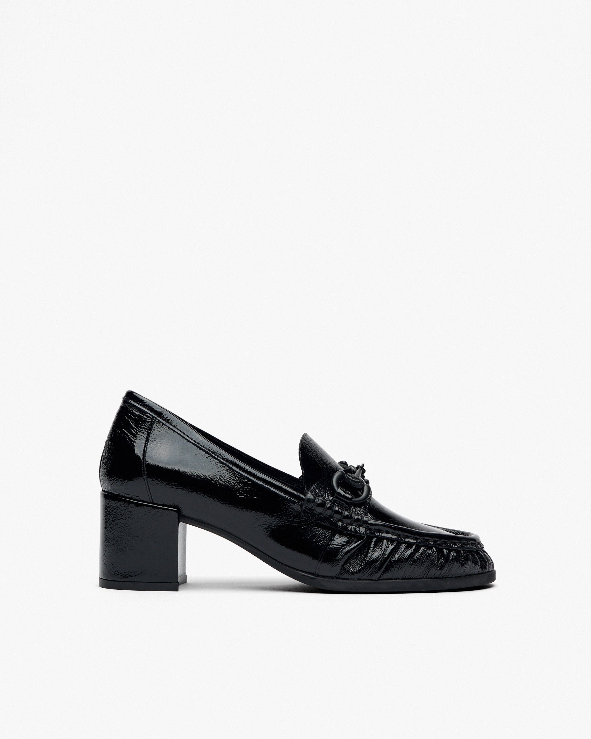 Black patent leather high heel shoes. PEDRO MIRALLES Black