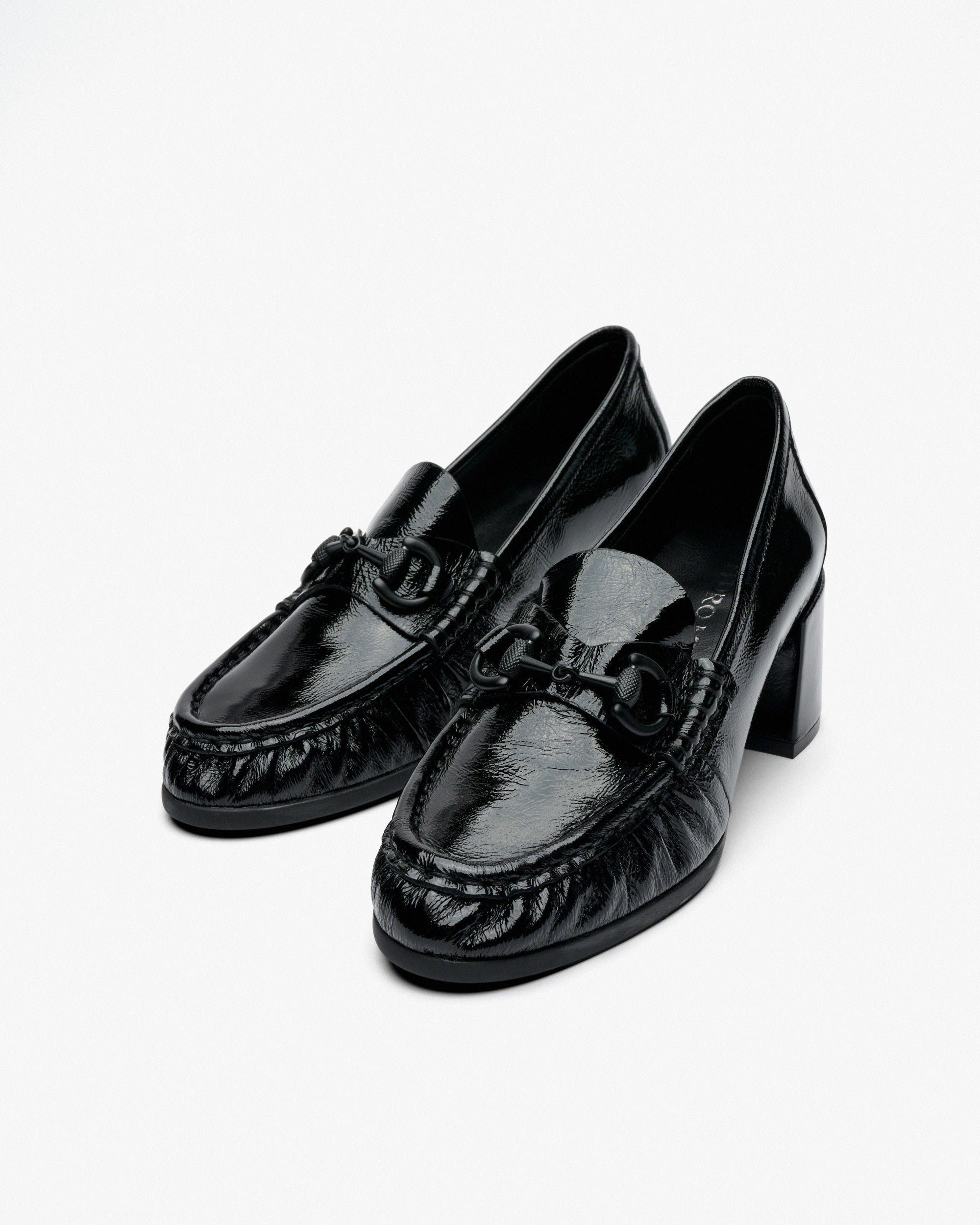 Black patent leather high heel shoes. PEDRO MIRALLES Black