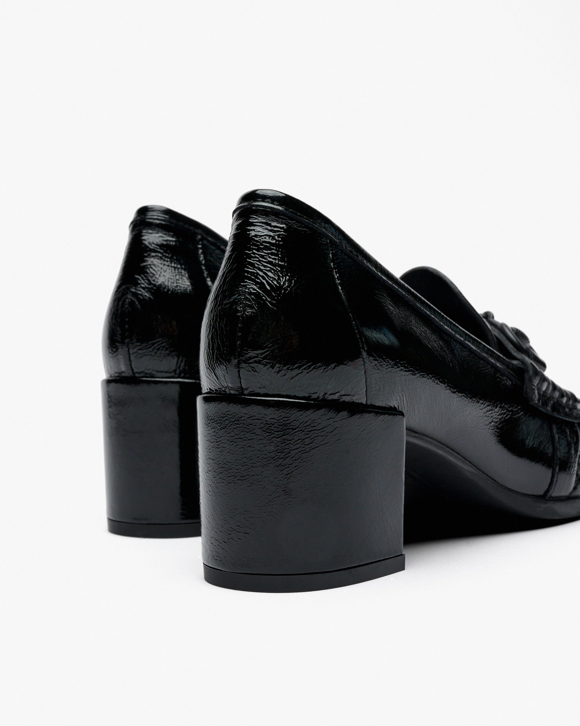 Black patent leather high heel shoes. PEDRO MIRALLES Black