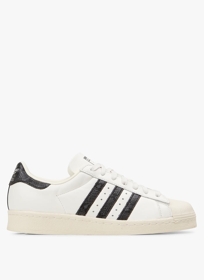 Zapatillas bajas de piel en blanco