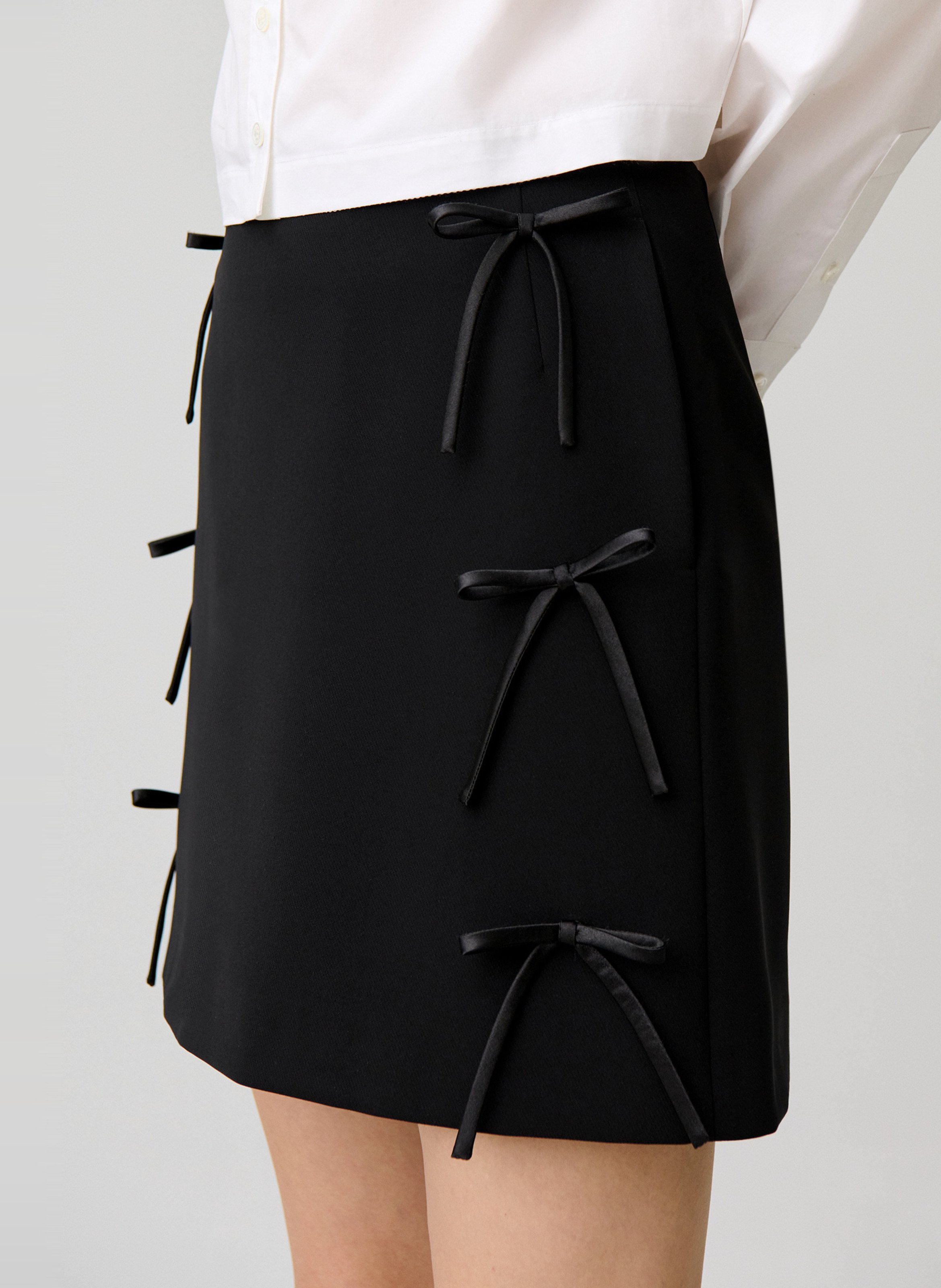 Jupe courte droite ornée de noeuds CLAUDIE PIERLOT Noir