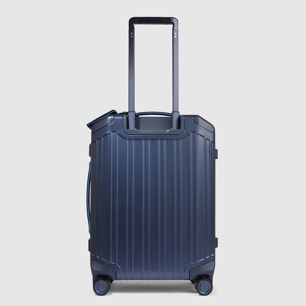 Cabin trolley suitcase with 4 wheels in aluminum and leather with TSA lock and connequ. PIQUADRO Blue