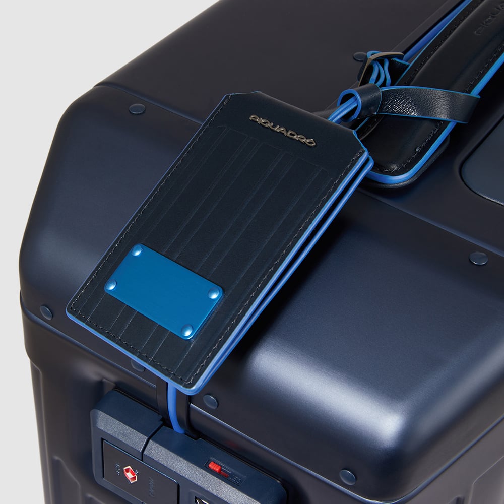 Cabin trolley suitcase with 4 wheels in aluminum and leather with TSA lock and connequ. PIQUADRO Blue