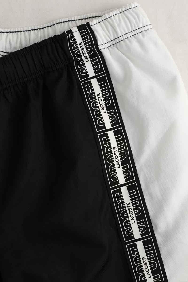 Sports trousers LACOSTE - SECONDE MAIN Black