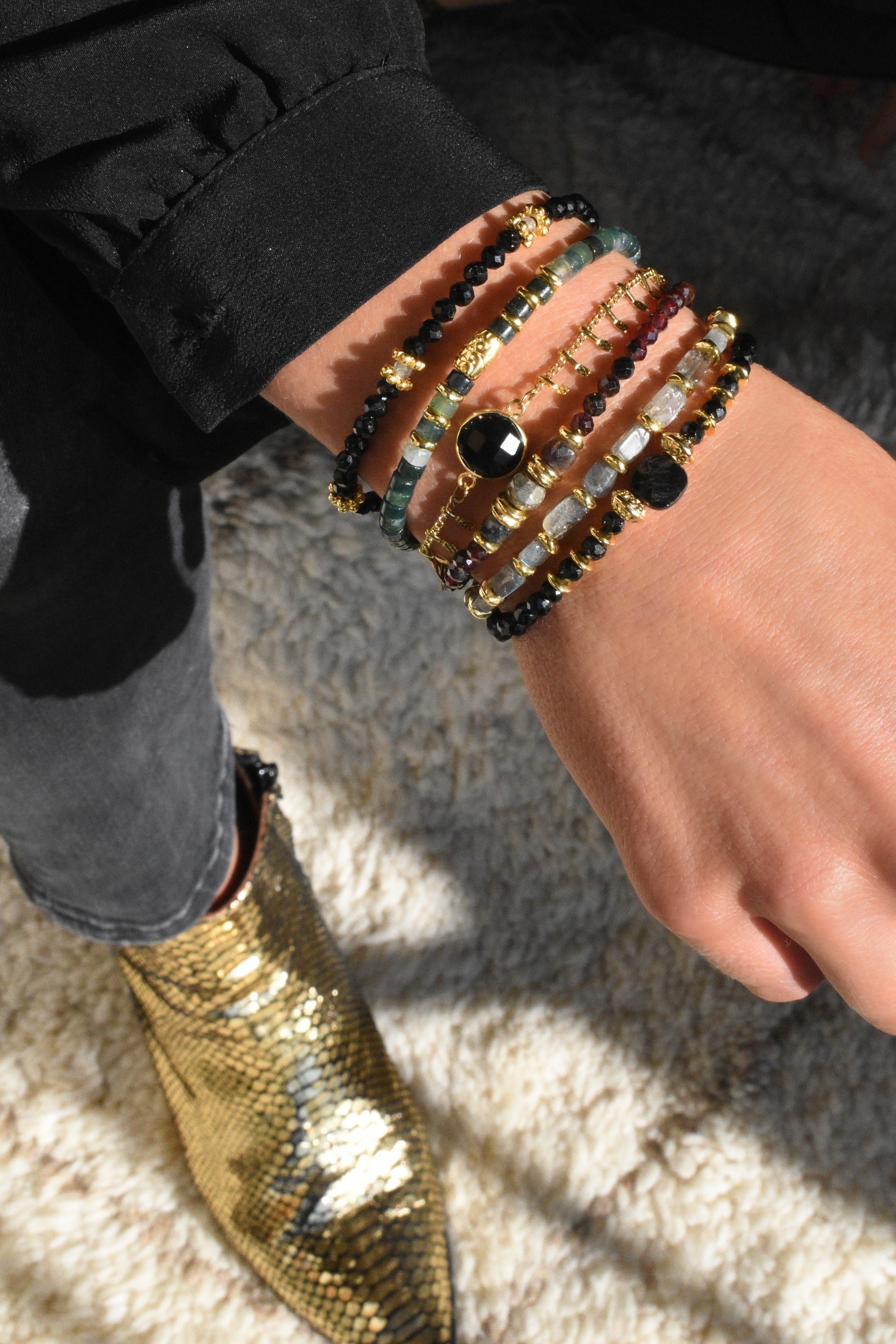 Garnet, pyrite, tourmaline GINANDGER Blue