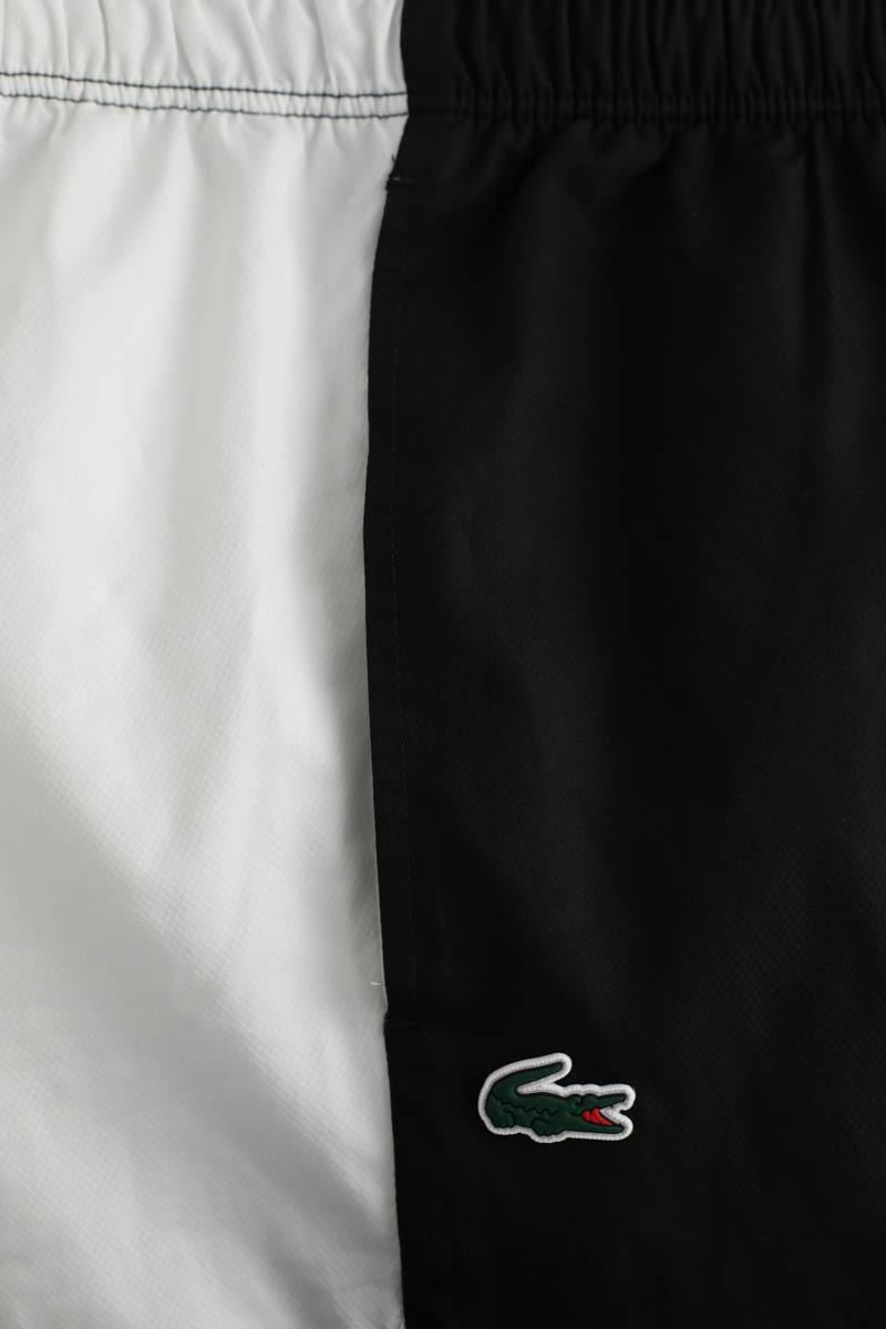 Sports trousers LACOSTE - SECONDE MAIN Black