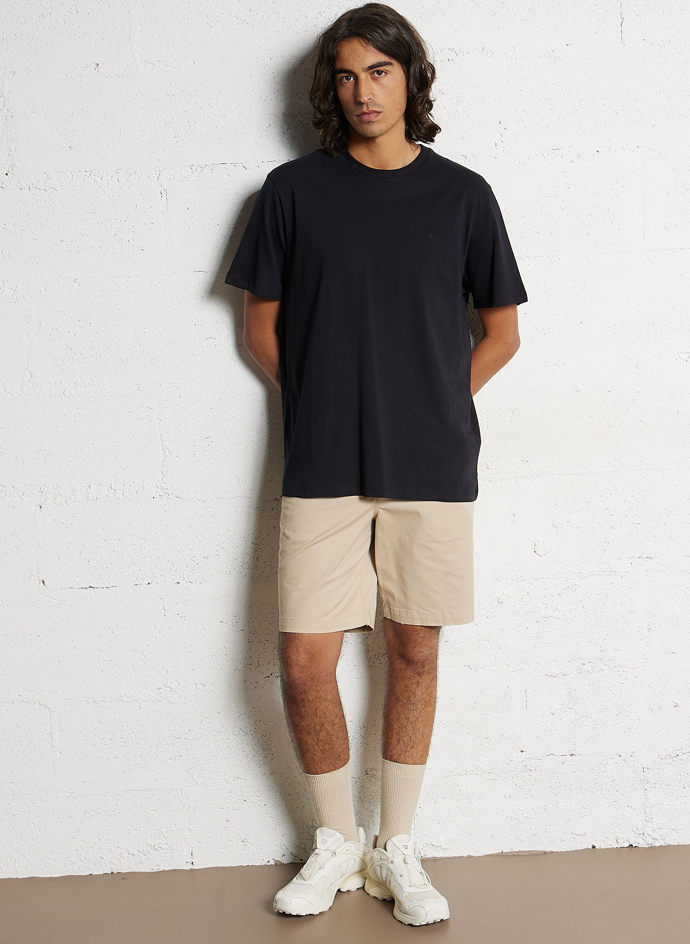 Short solid color chino in blended cotton. CALVIN KLEIN Beige