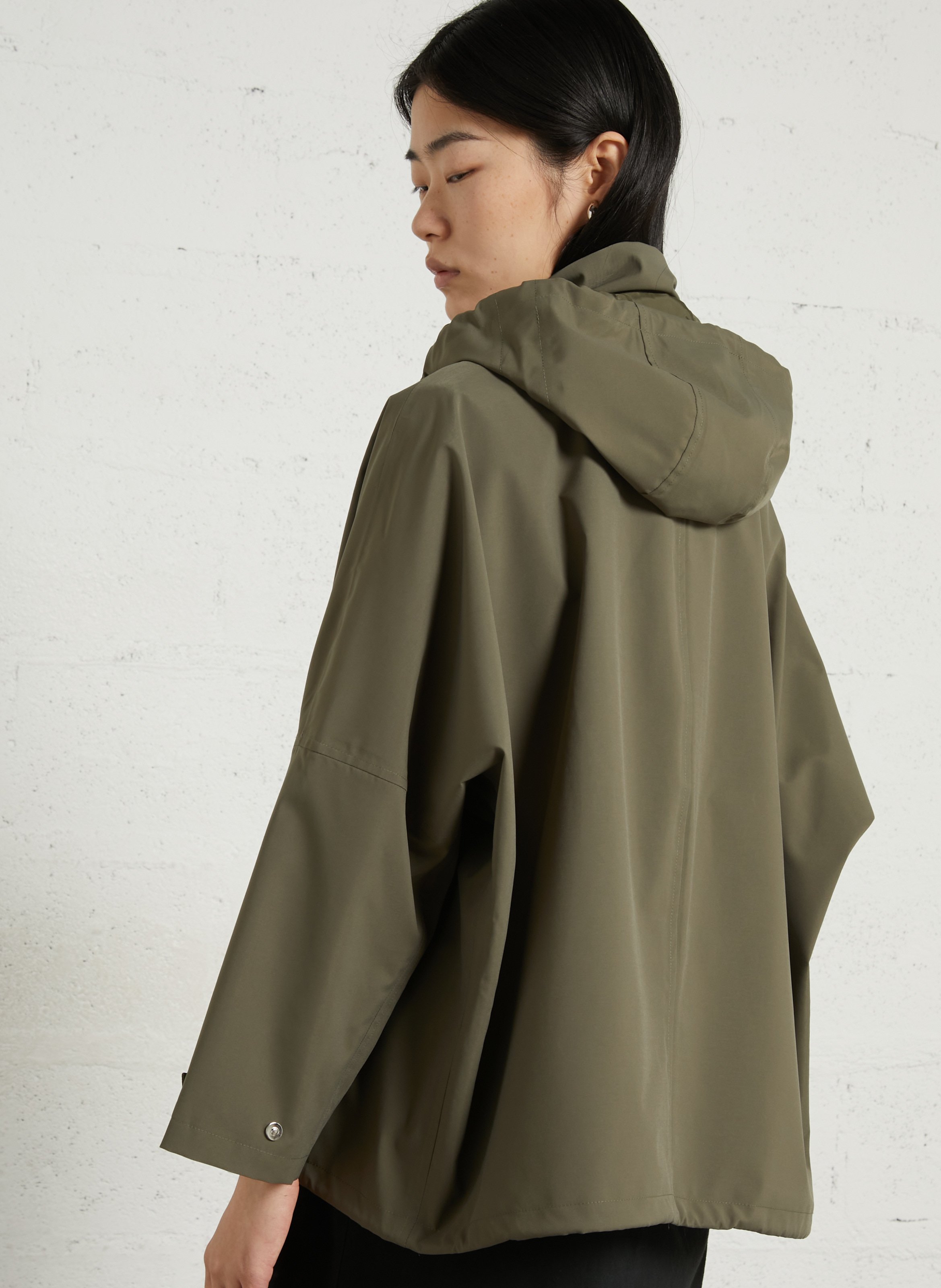 Buttoned and zipped high-neck fitted raincoat FLOTTE Green