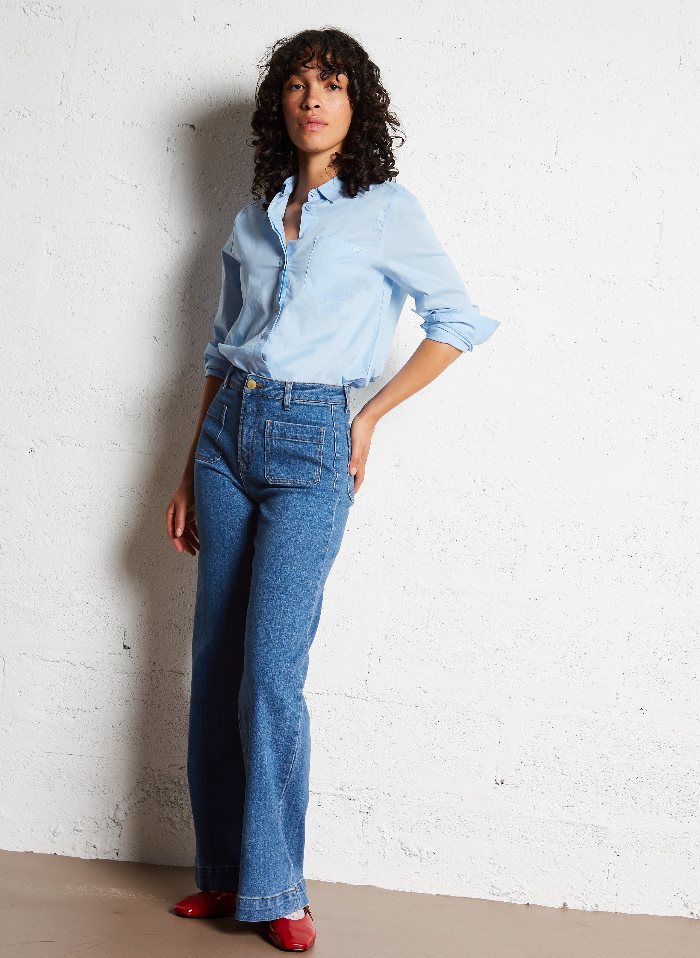 High-rise flared cotton-blend jeans Blue