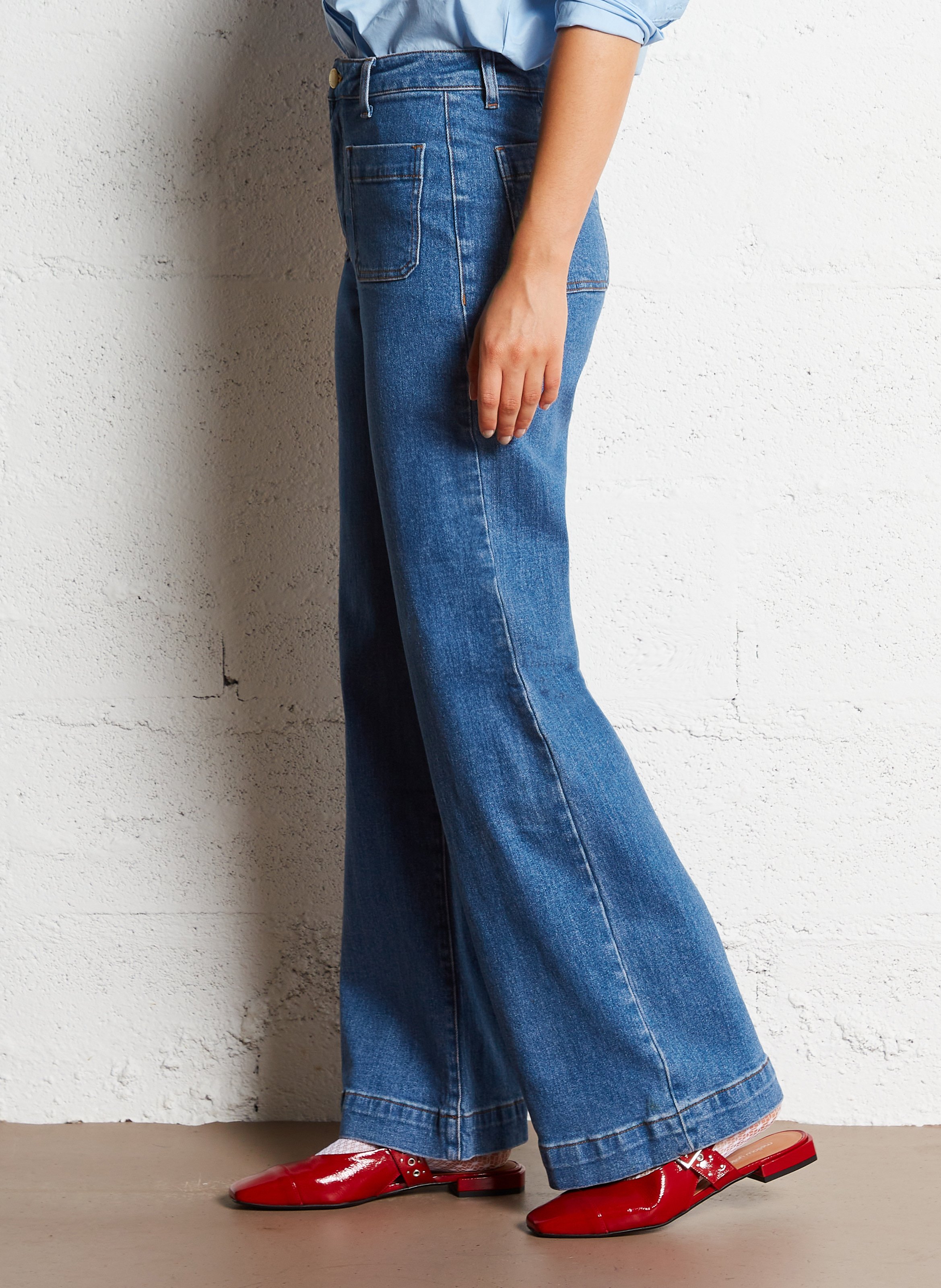 High-rise flared cotton-blend jeans Blue