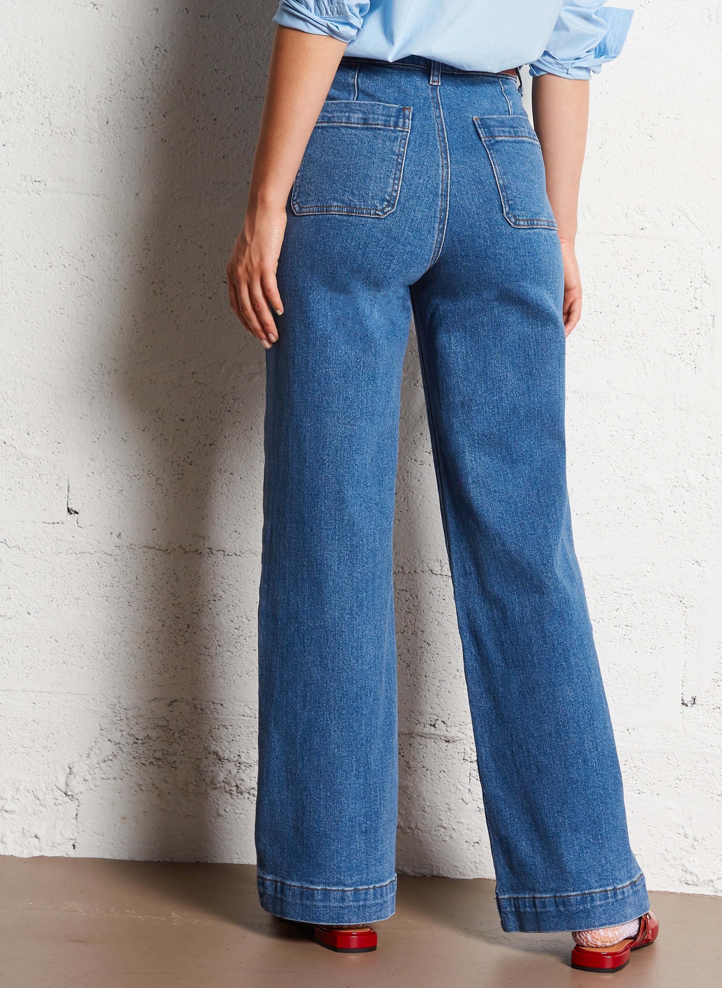 High-rise flared cotton-blend jeans Blue