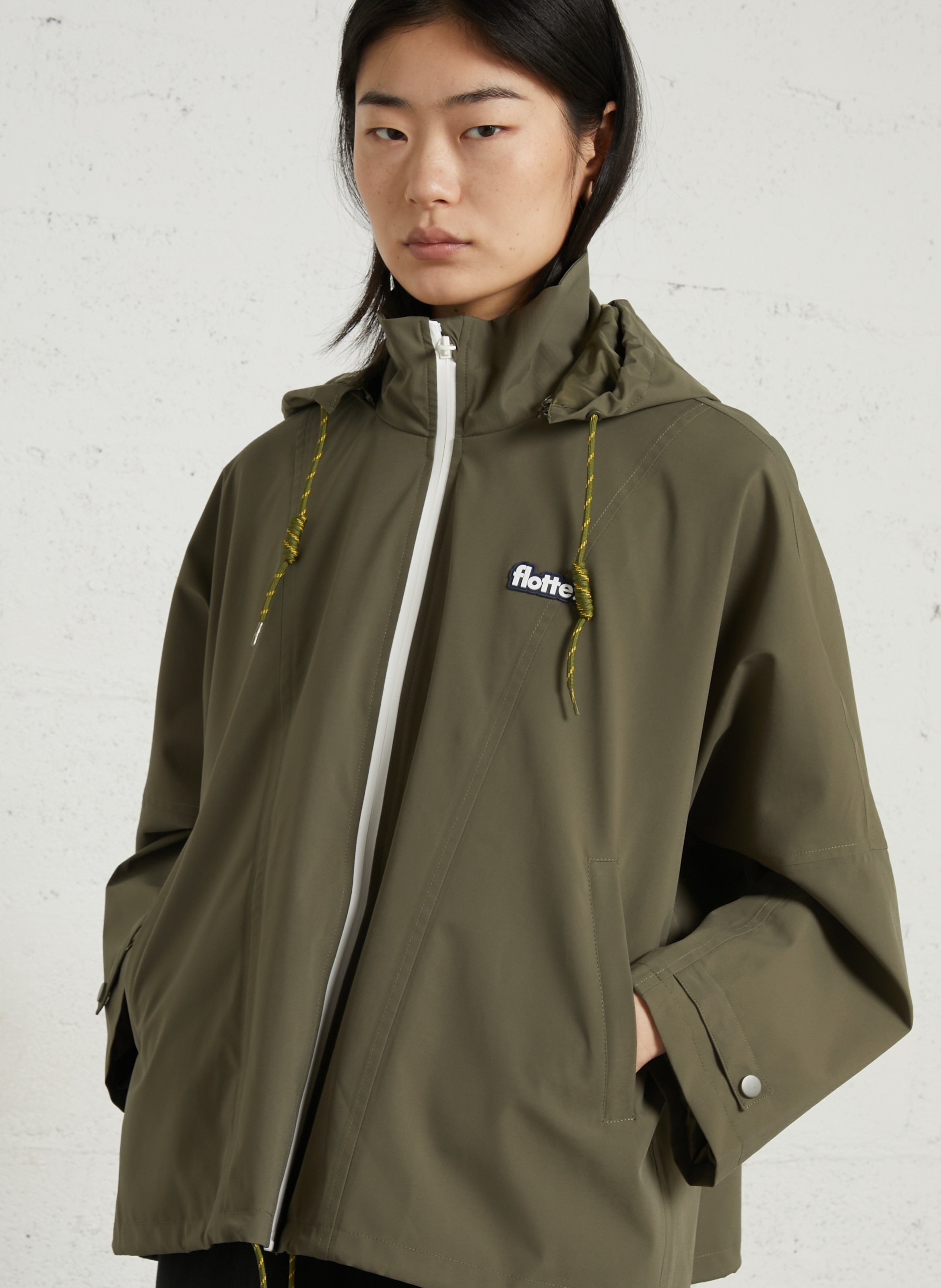 Buttoned and zipped high-neck fitted raincoat FLOTTE
