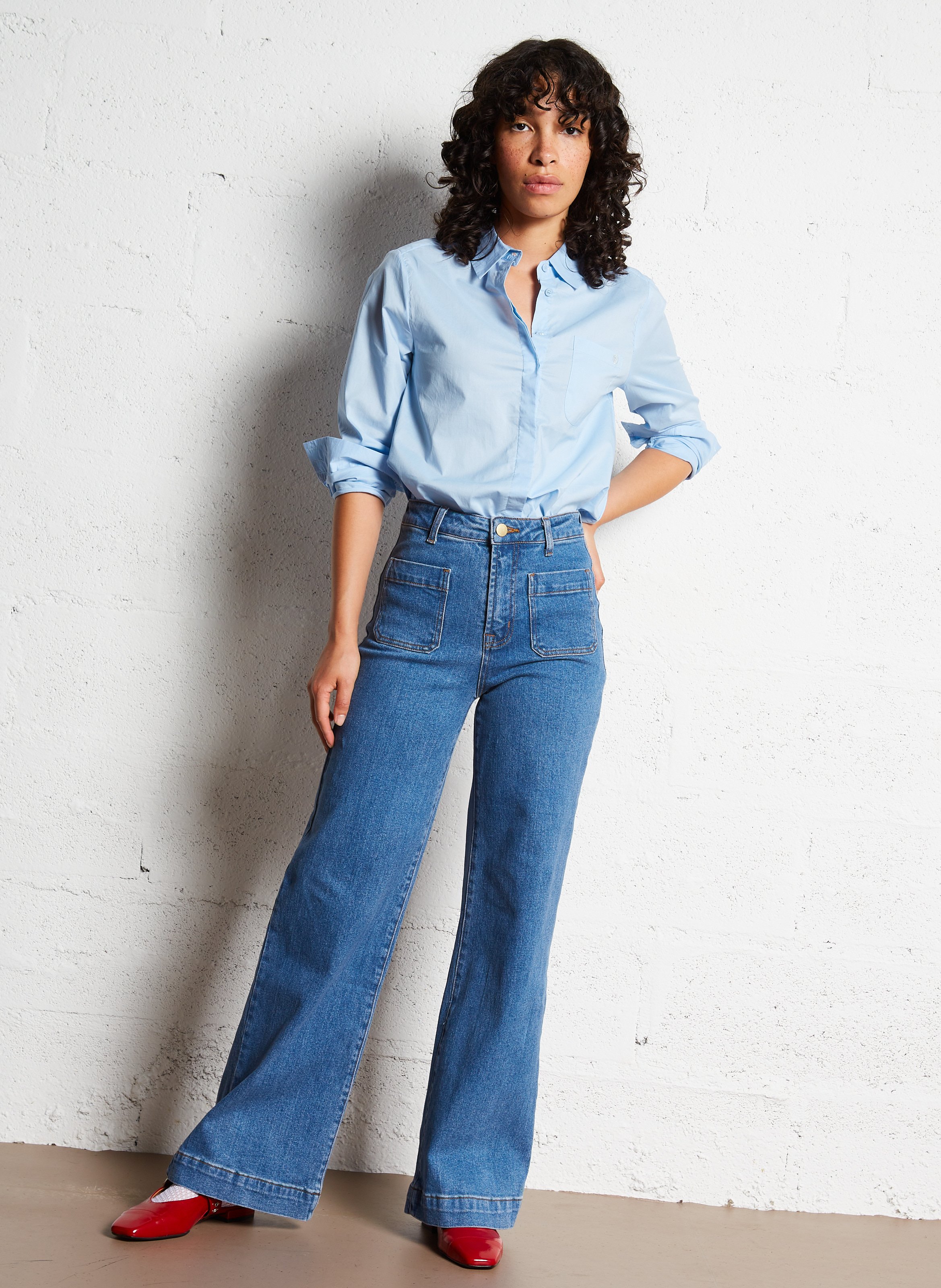 High-rise flared cotton-blend jeans Blue