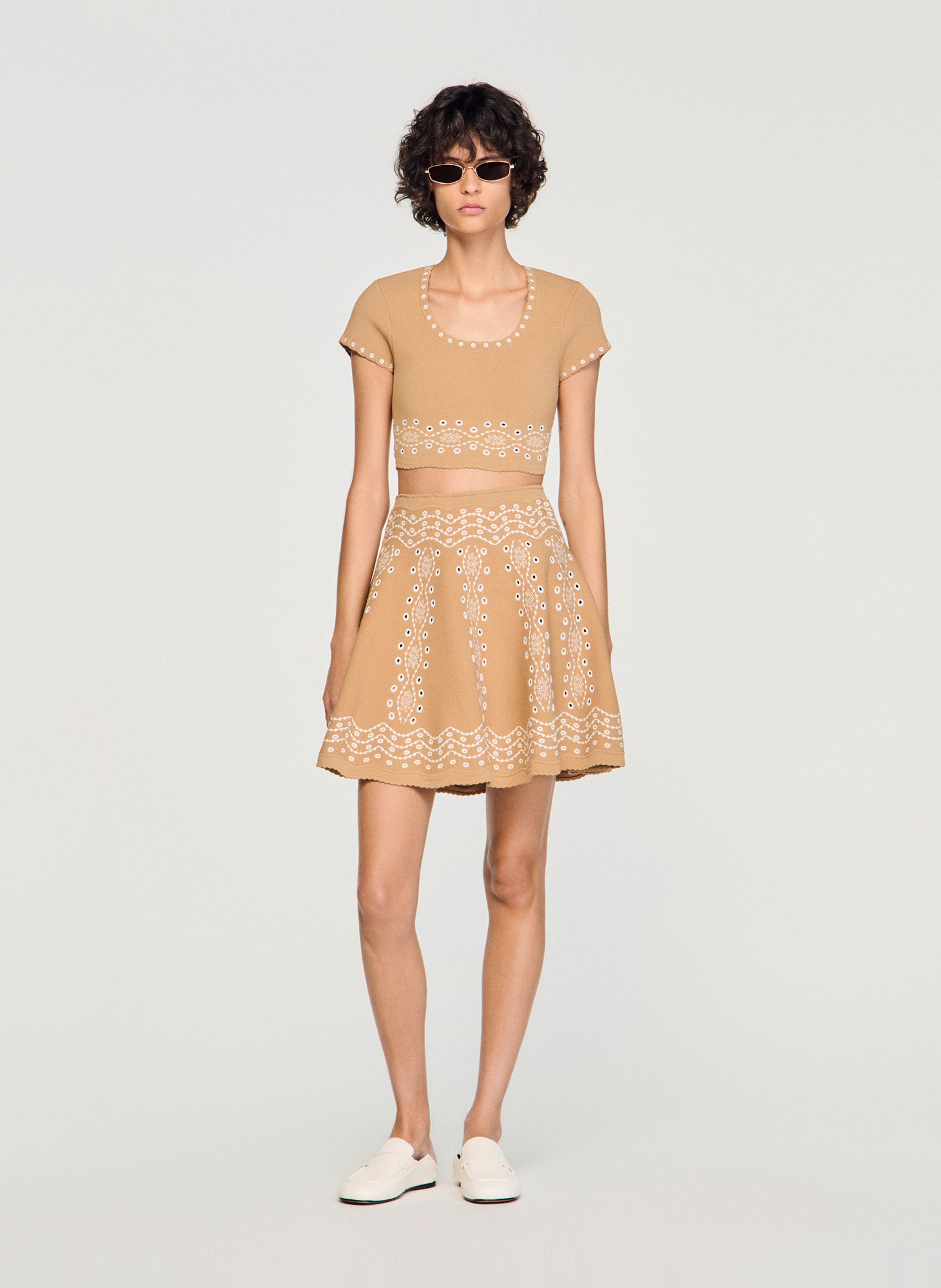 Korte uitlopende rok met borduursels SANDRO Beige