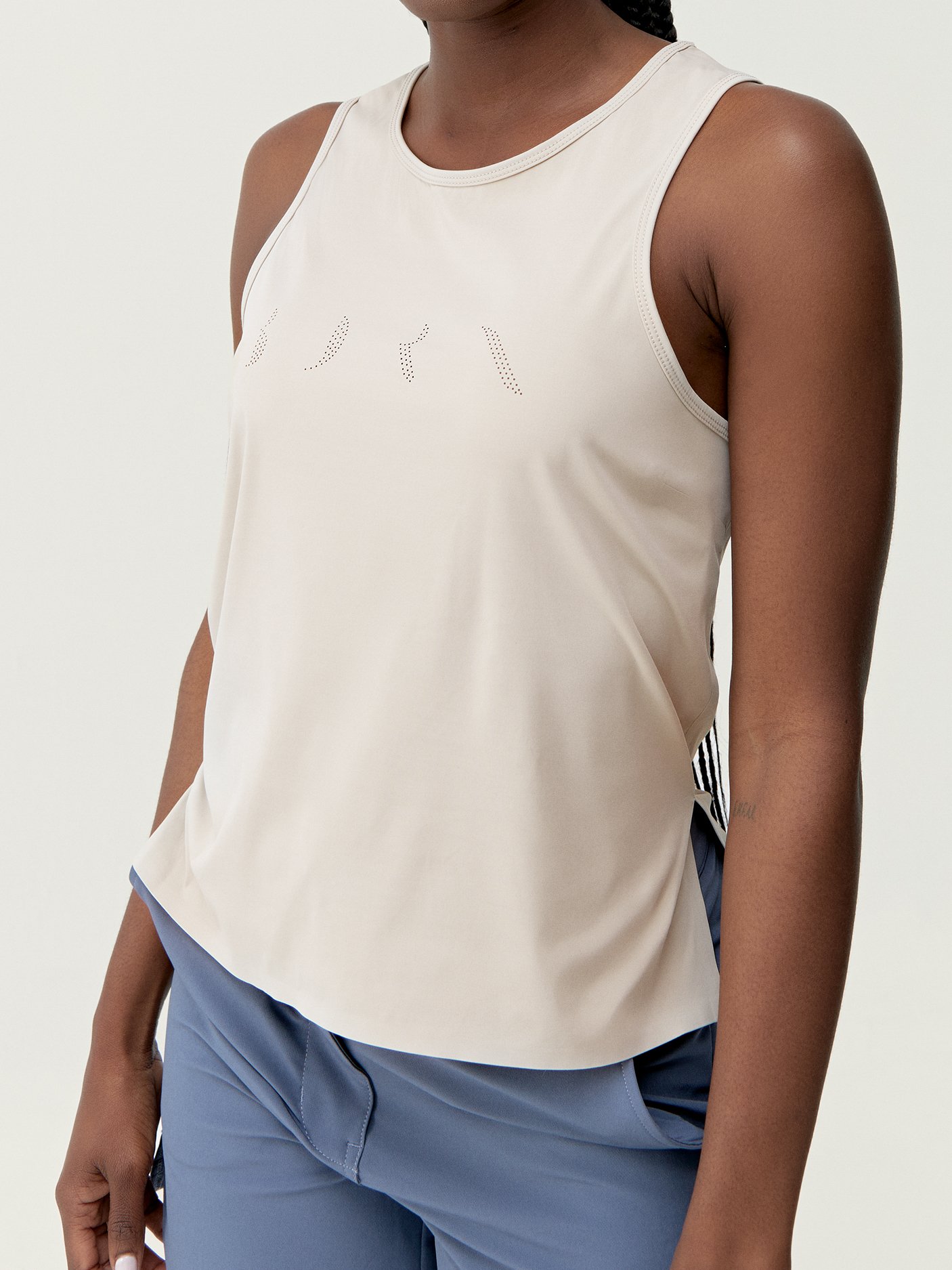 Tank top with logo on the front BORN LIVING YOGA Beige