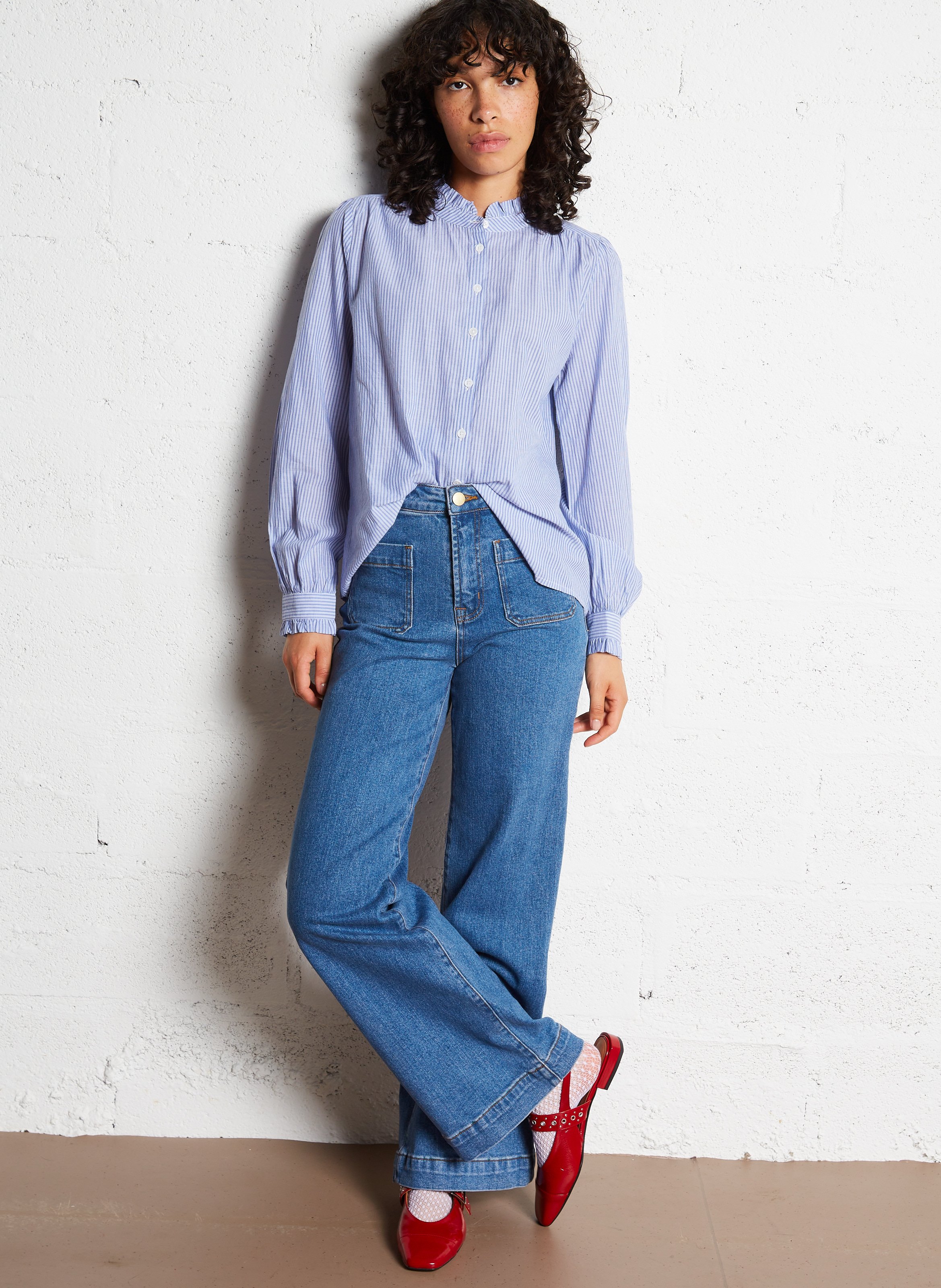 High-rise flared cotton-blend jeans Blue