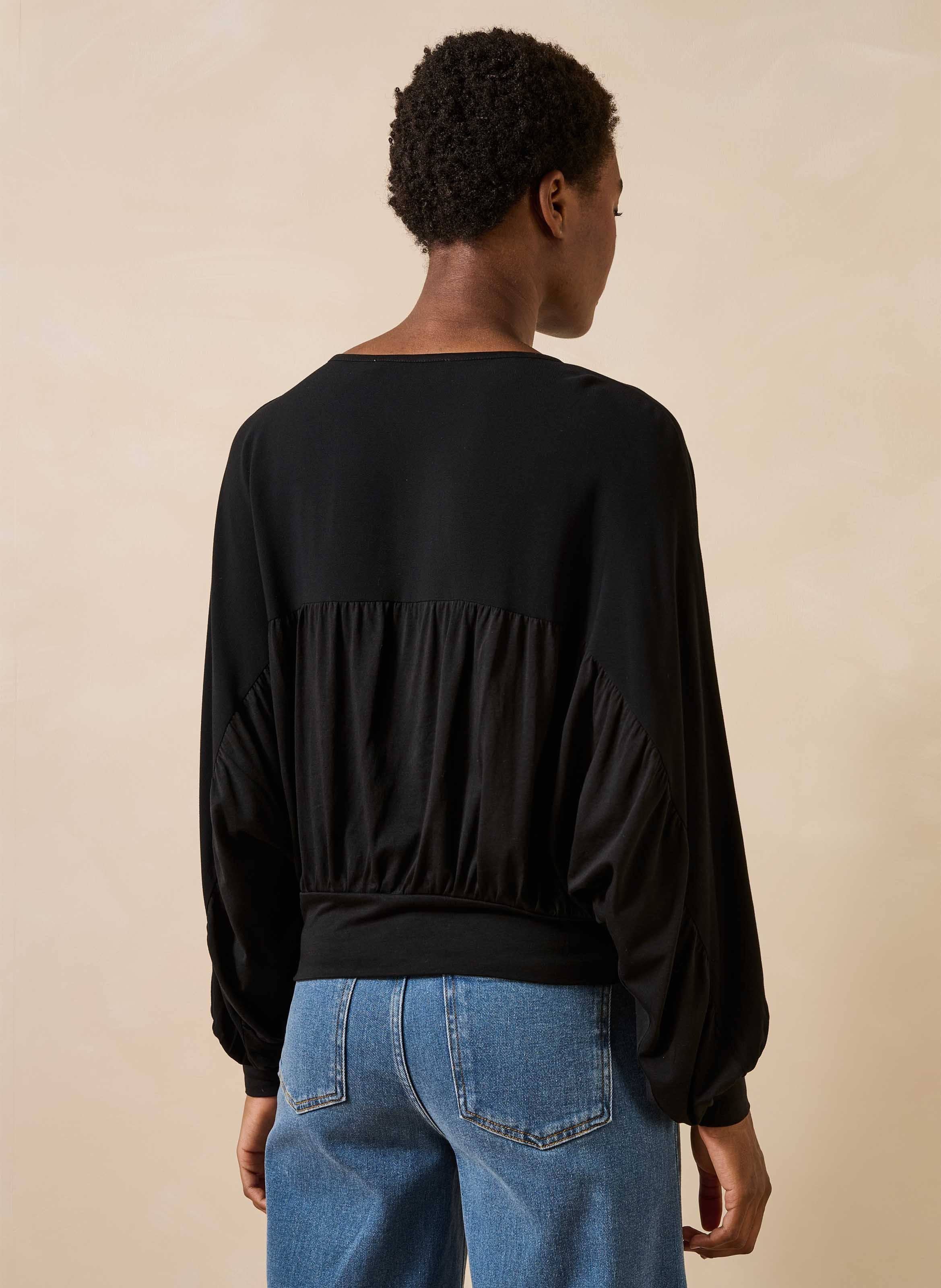 Top with batwing sleeves and mixed materials LA FEE MARABOUTEE Black