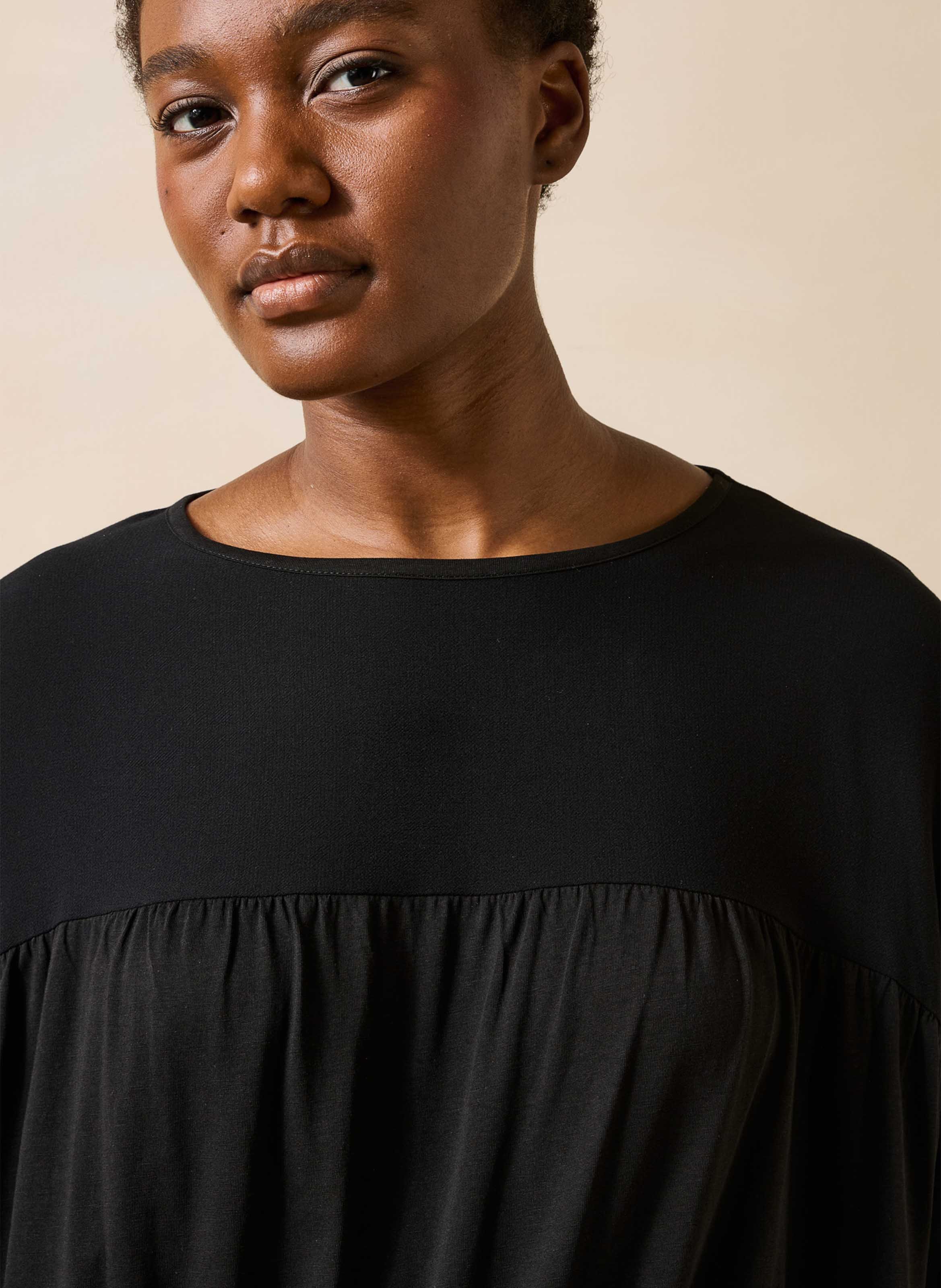 Top with batwing sleeves and mixed materials LA FEE MARABOUTEE Black