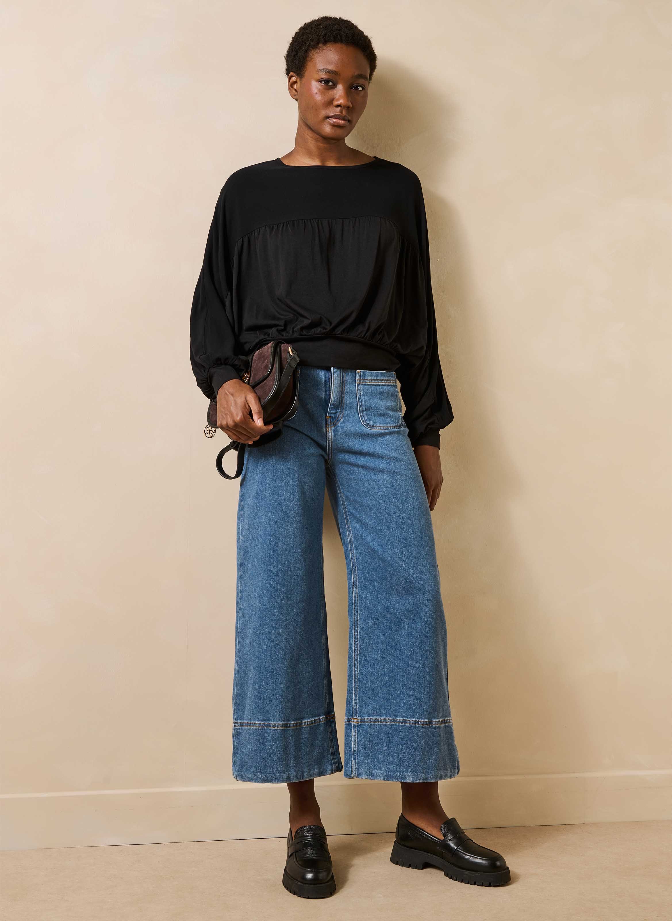 Top with batwing sleeves and mixed materials LA FEE MARABOUTEE Black