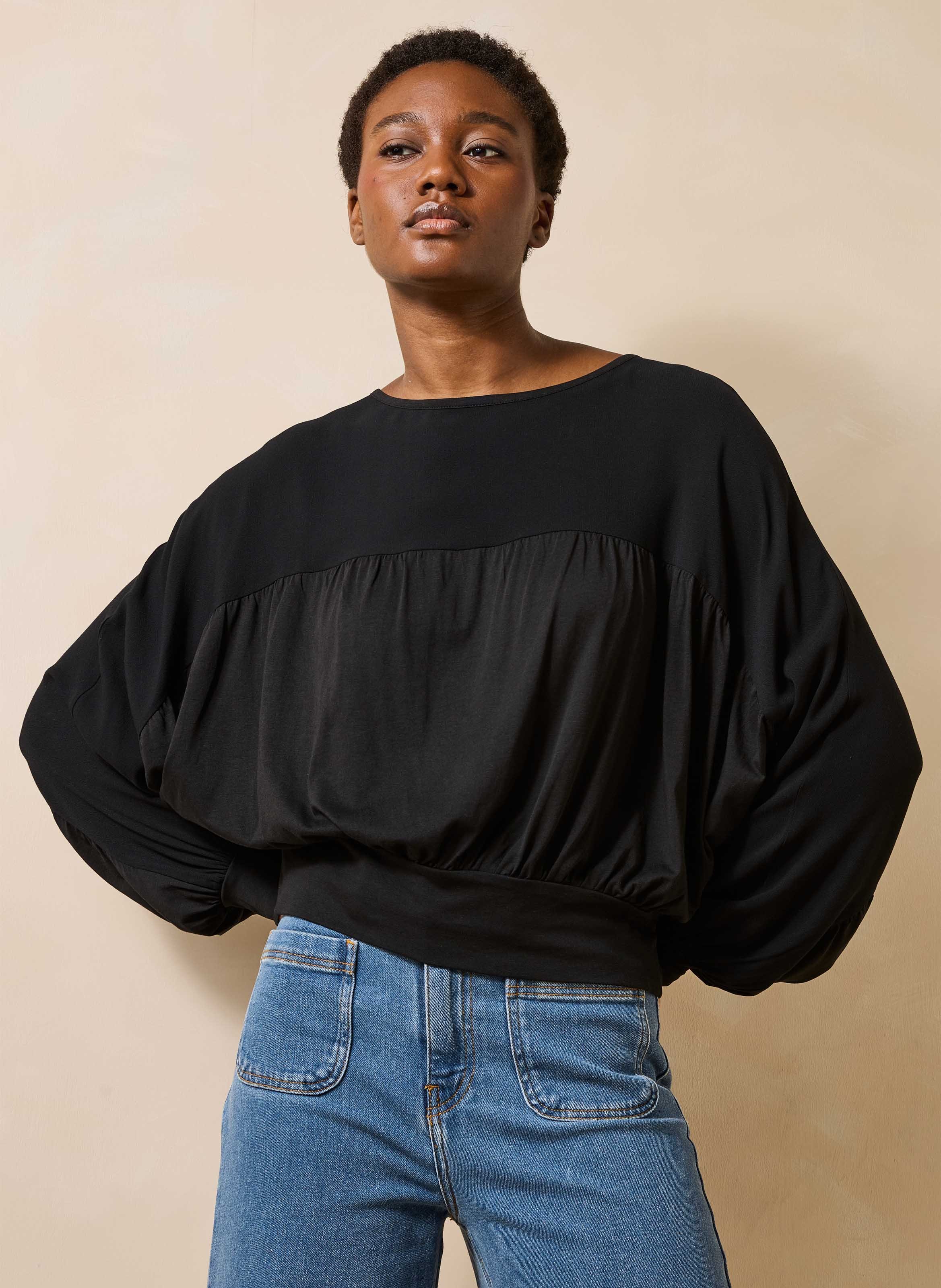 Top with batwing sleeves and mixed materials LA FEE MARABOUTEE Black