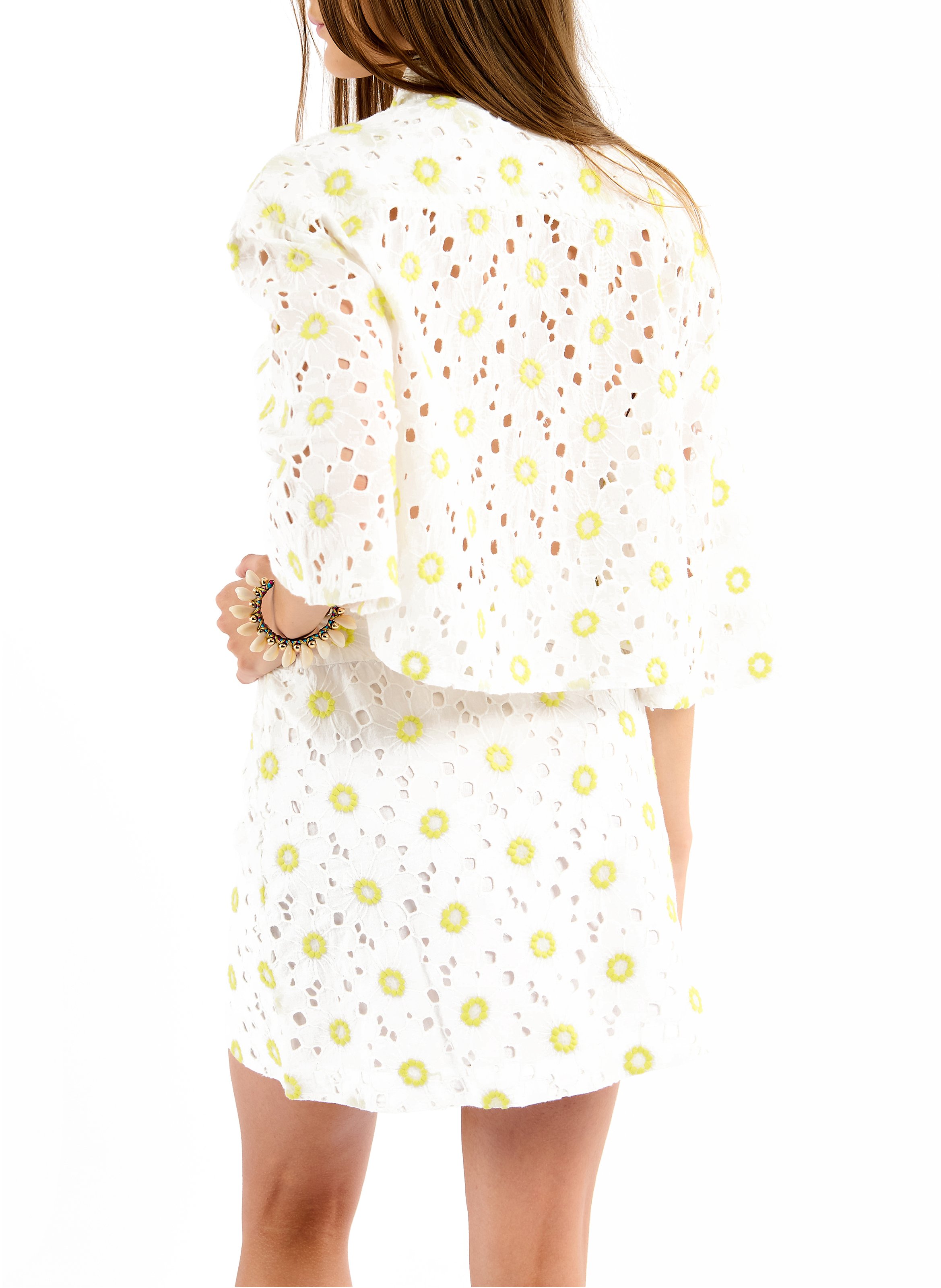 Short trapeze skirt with English embroidery. WILD White