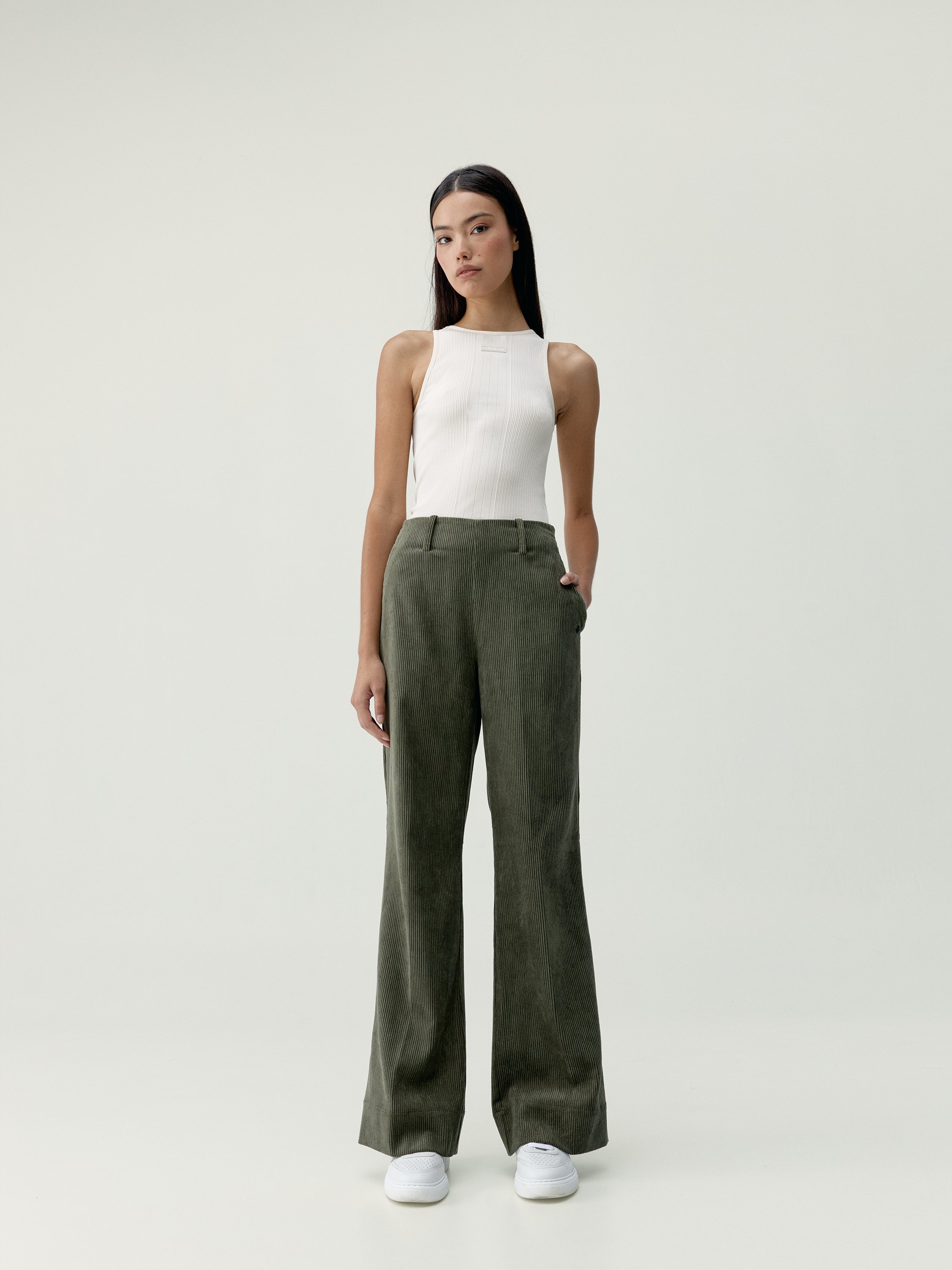 Women's zinnia wide leg sports pants with zippered pockets. BORN Green