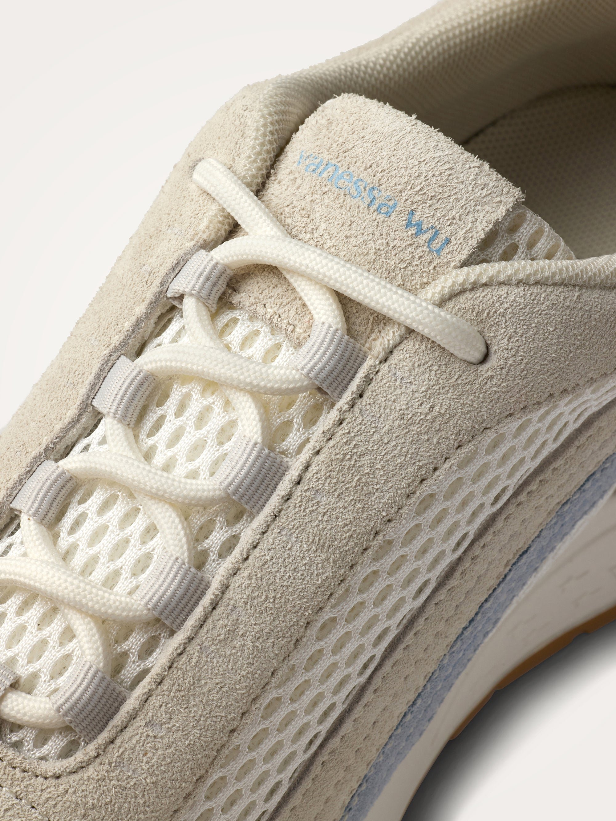 Sneakers with side panels on a sporty sole VANESSA WU Blue