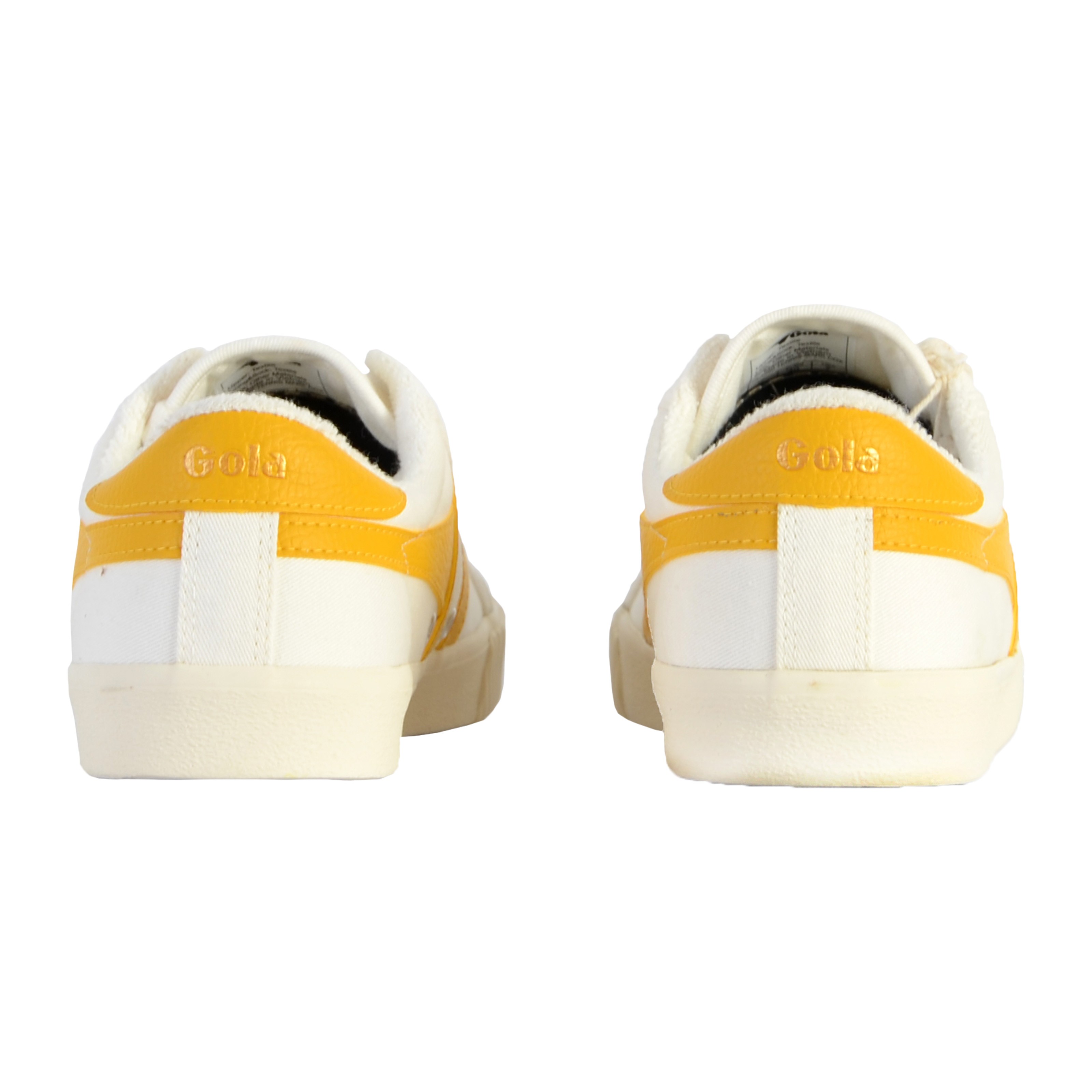 Lace-up flat tennis shoes by Mark Cox. GOLA White
