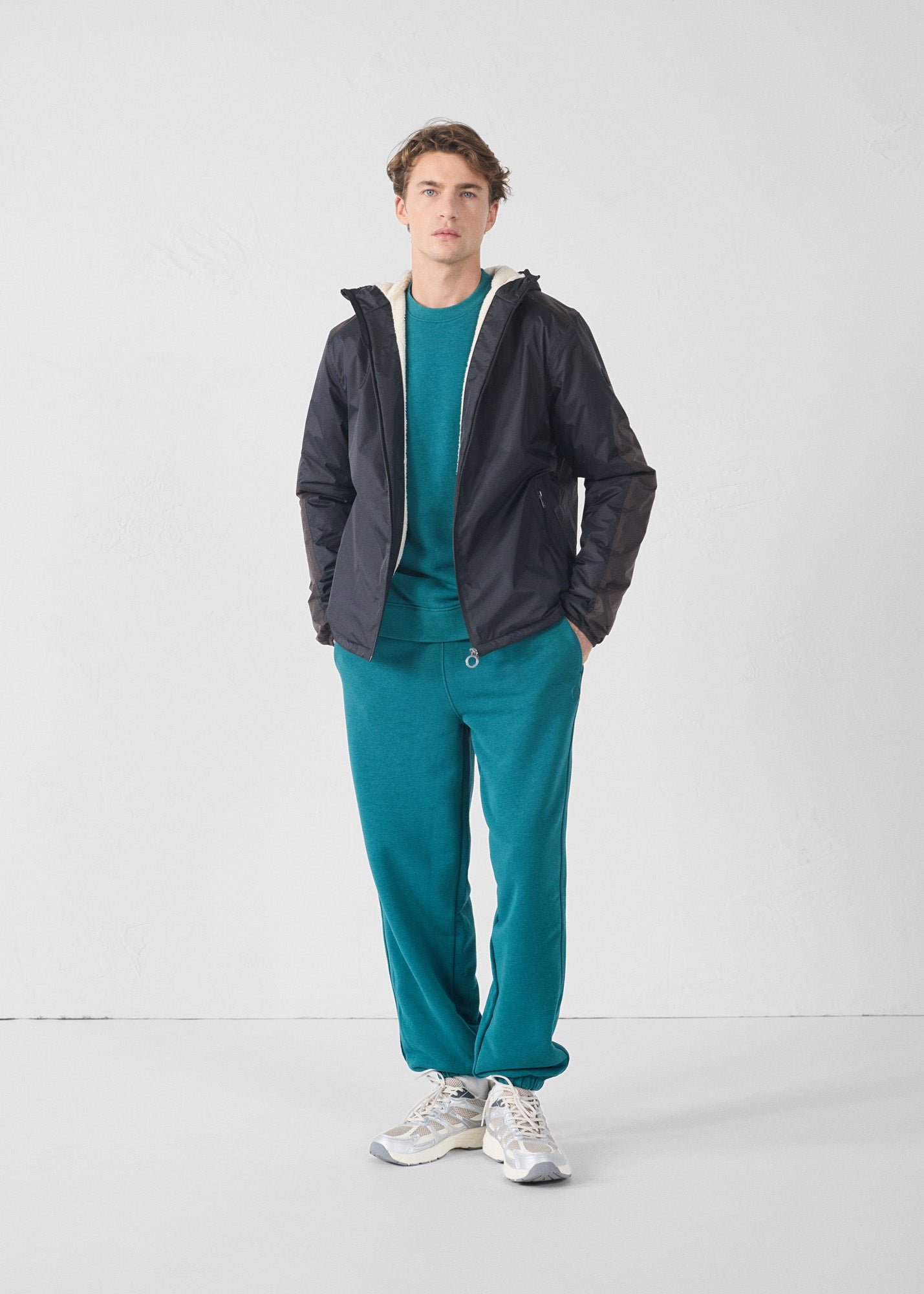 Sherpa-lined waterproof coat. Black