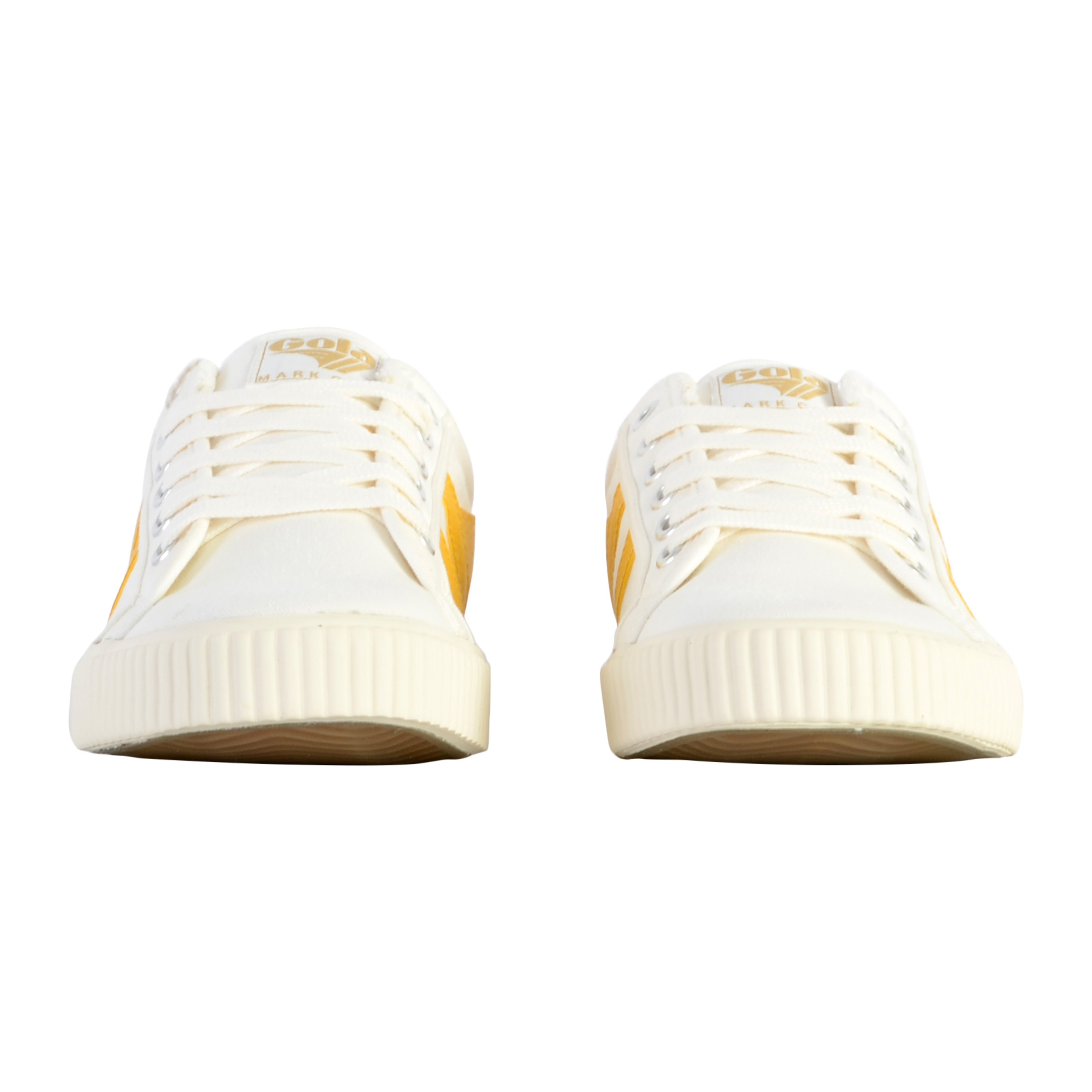 Lace-up flat tennis shoes by Mark Cox. GOLA White