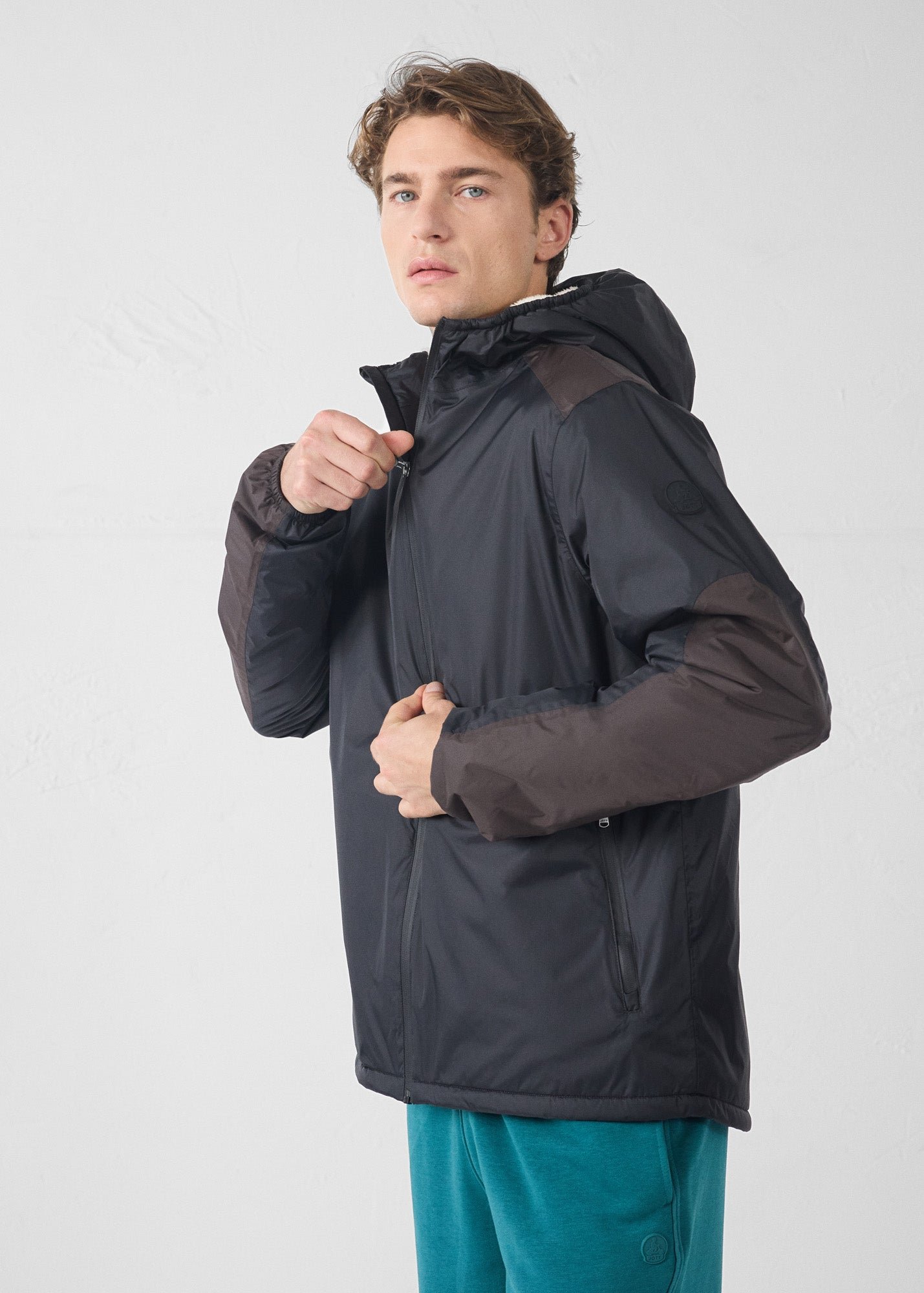 Sherpa-lined waterproof coat. Black