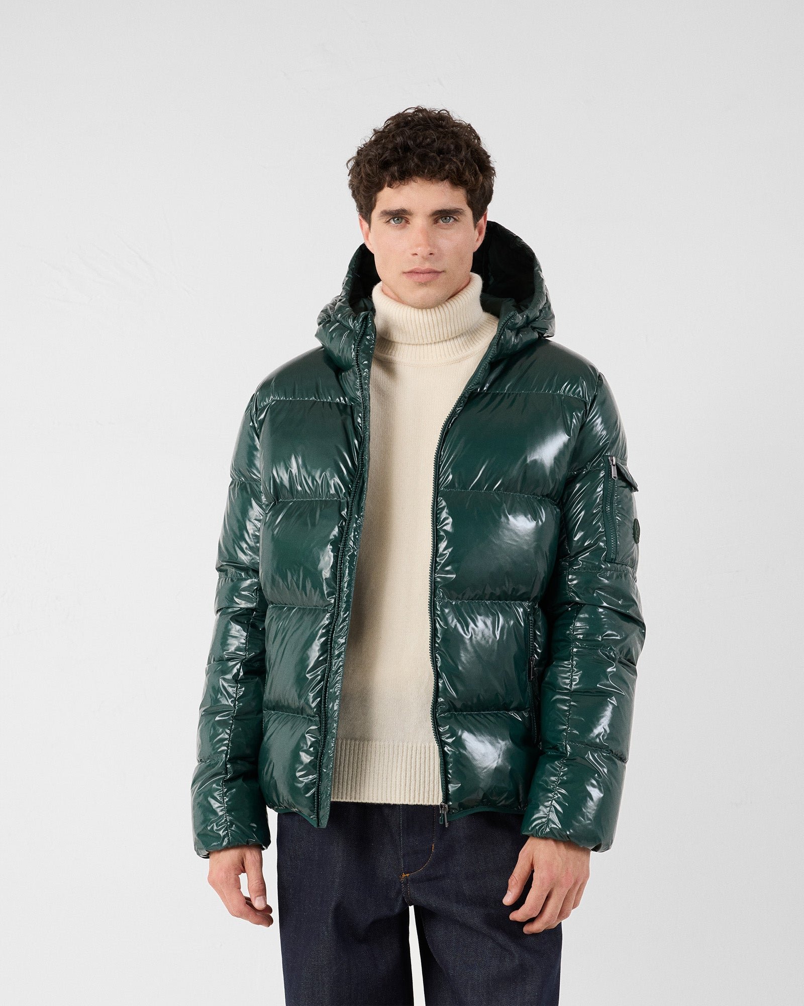 Hooded down jacket for extreme cold in lacquered Java forest. JOTT Green
