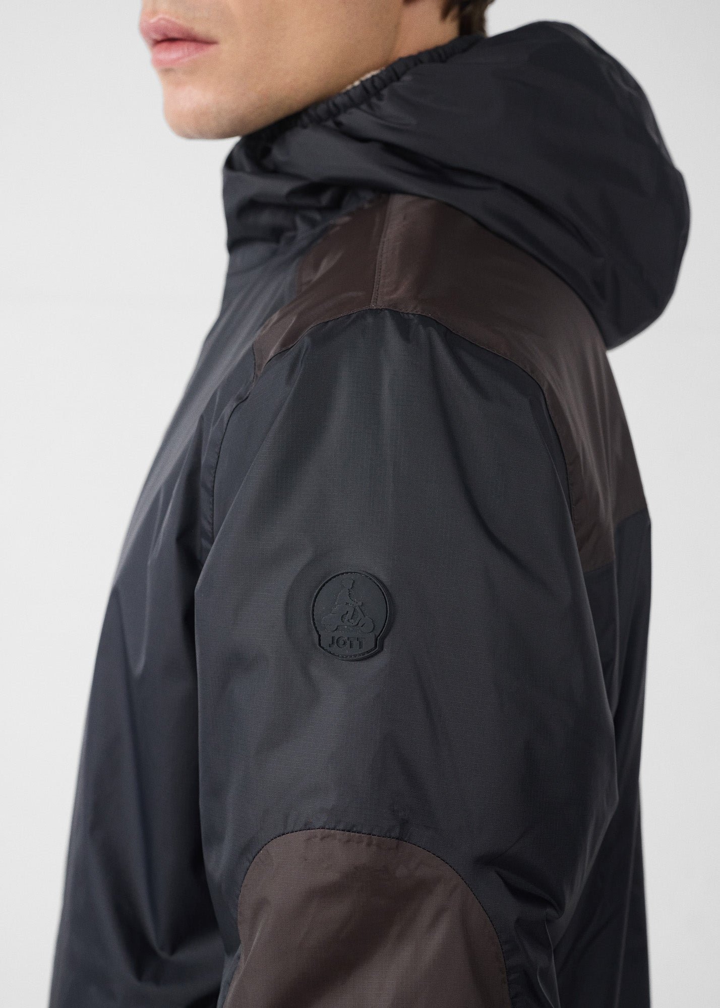 Sherpa-lined waterproof coat. Black