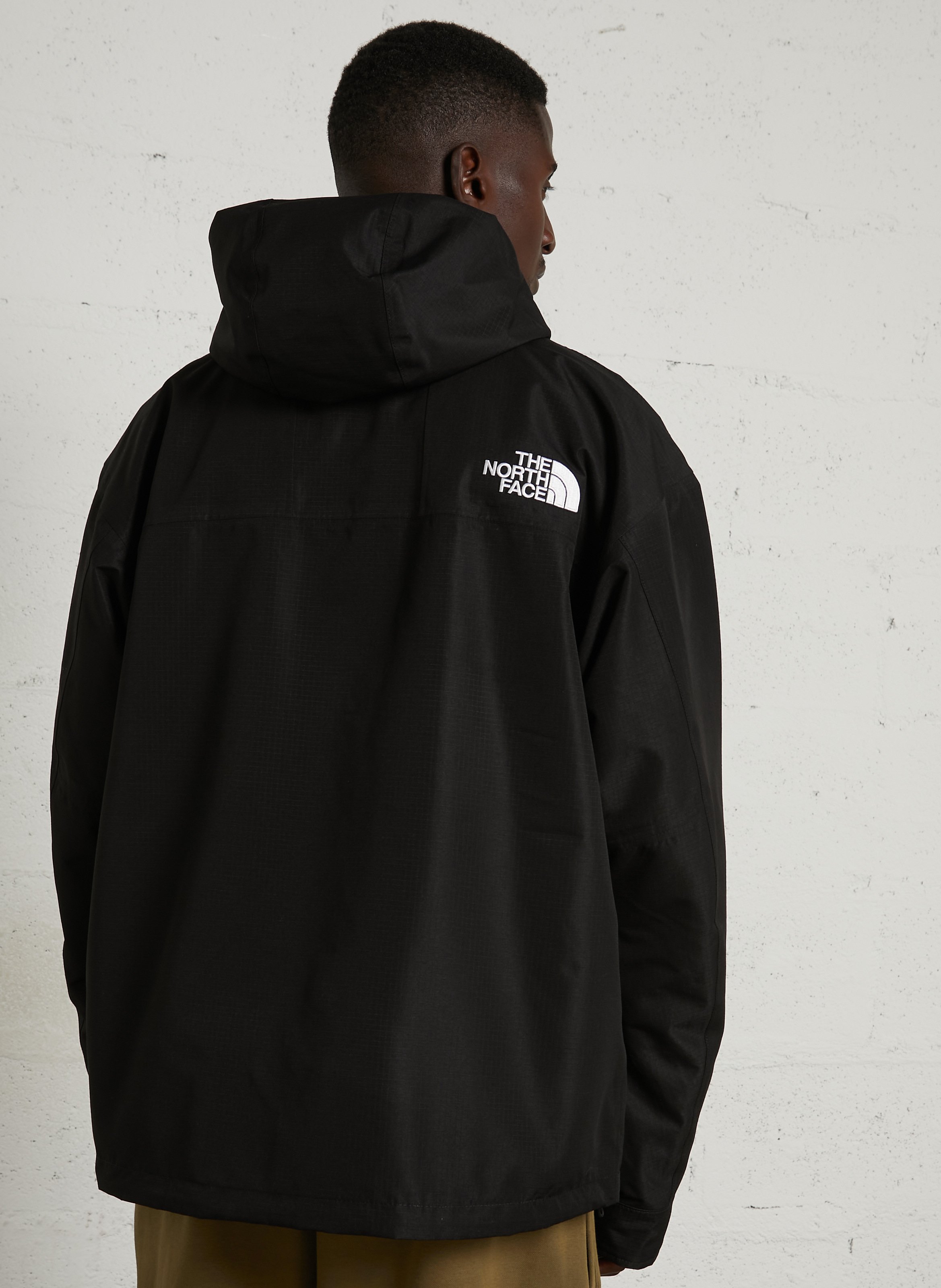 Windjacke mit Kapuze THE NORTH FACE Schwarz