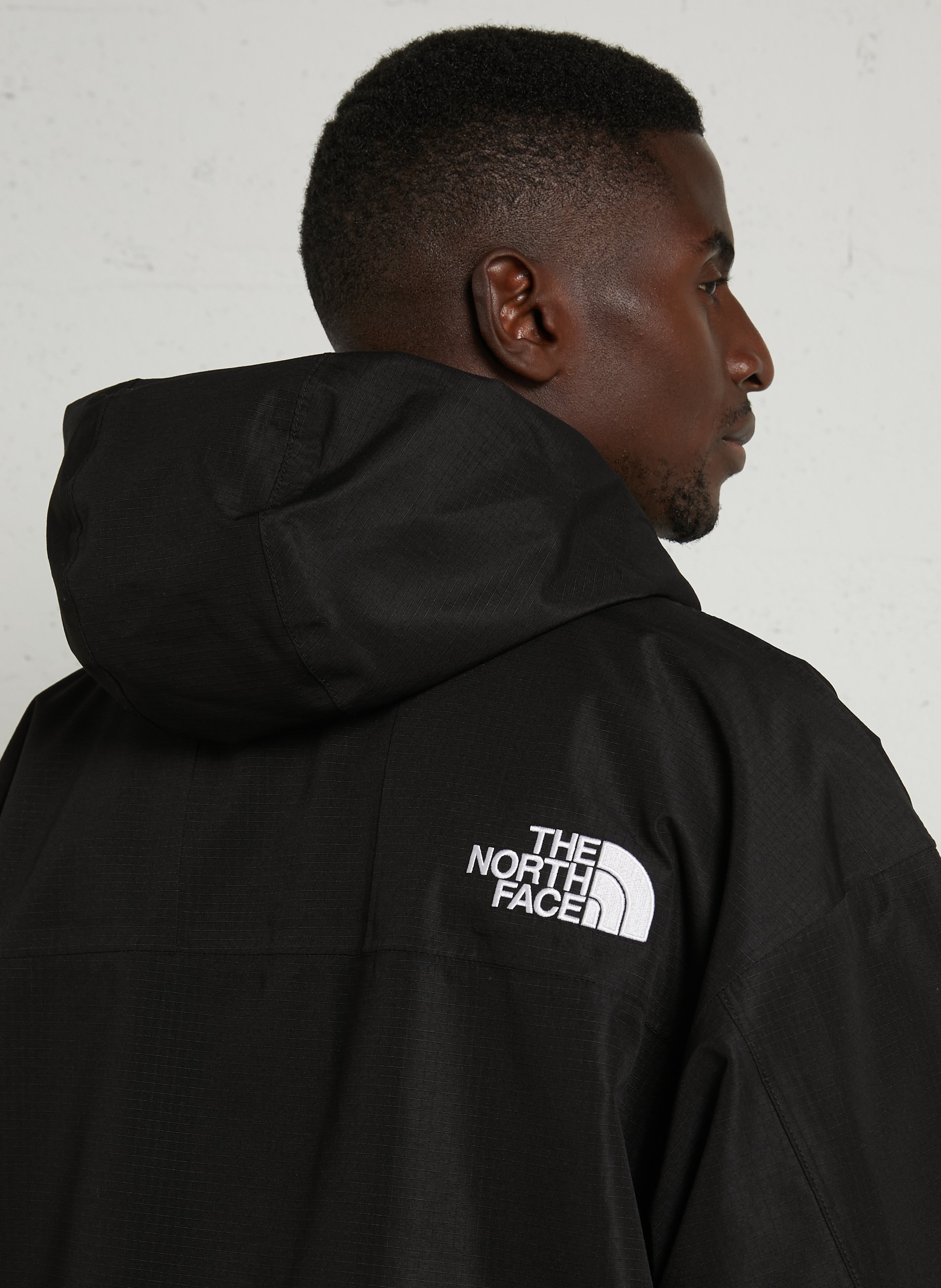Windjacke mit Kapuze THE NORTH FACE Schwarz