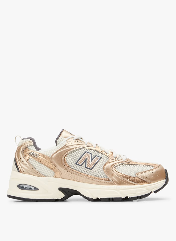 New balance doré shop femme