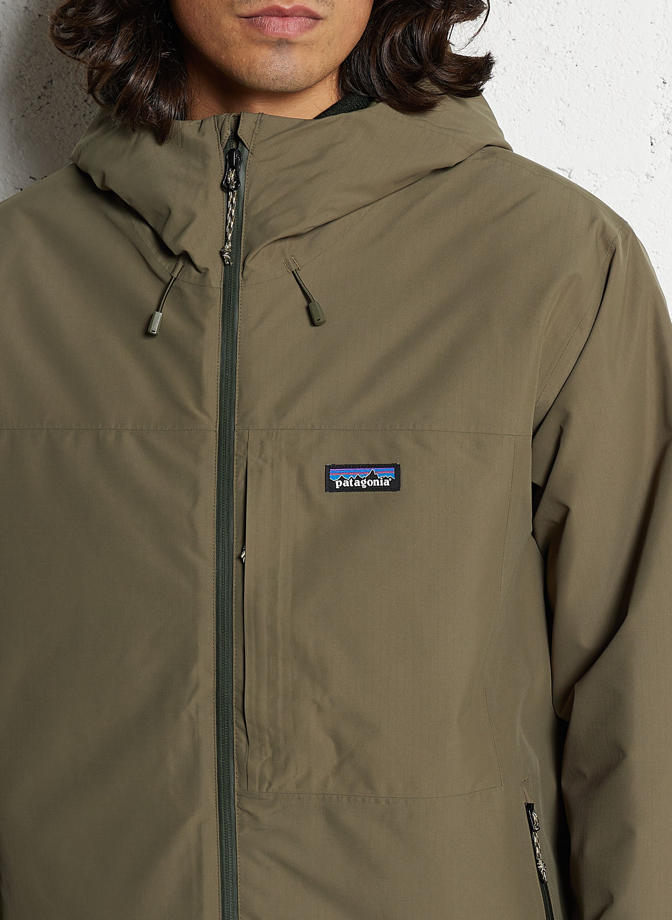 Buttoned and zipped high-neck fitted raincoat PATAGONIA Green