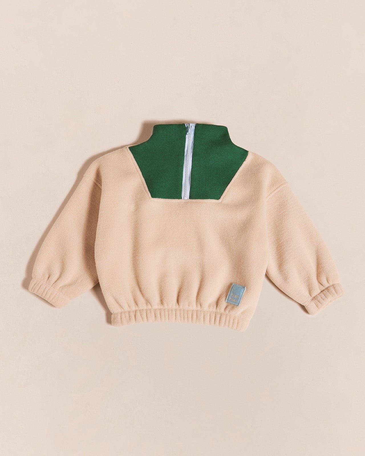 The Sun fleece sweatshirt made from recycled material with a zip-up collar. EMOI EMOI Beige