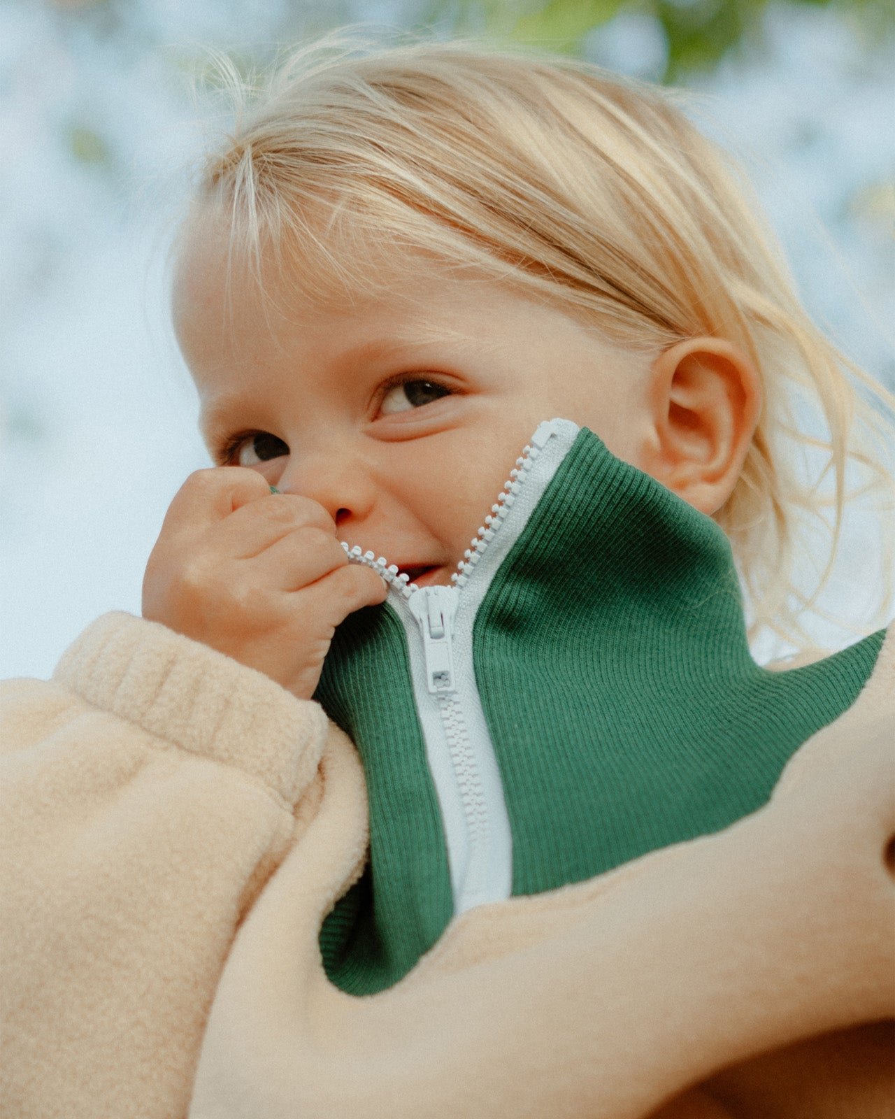 The Sun fleece sweatshirt made from recycled material with a zip-up collar. EMOI EMOI Beige