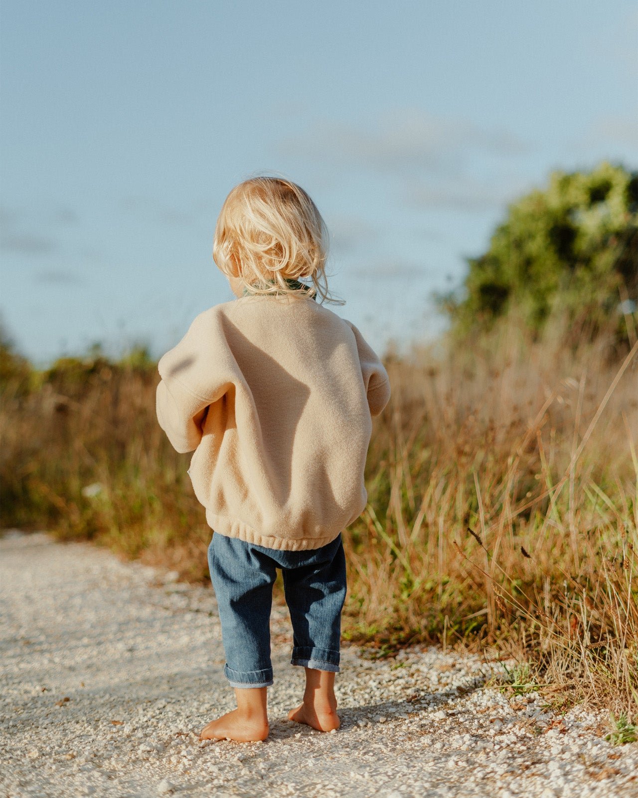 The Sun fleece sweatshirt made from recycled material with a zip-up collar. EMOI EMOI Beige