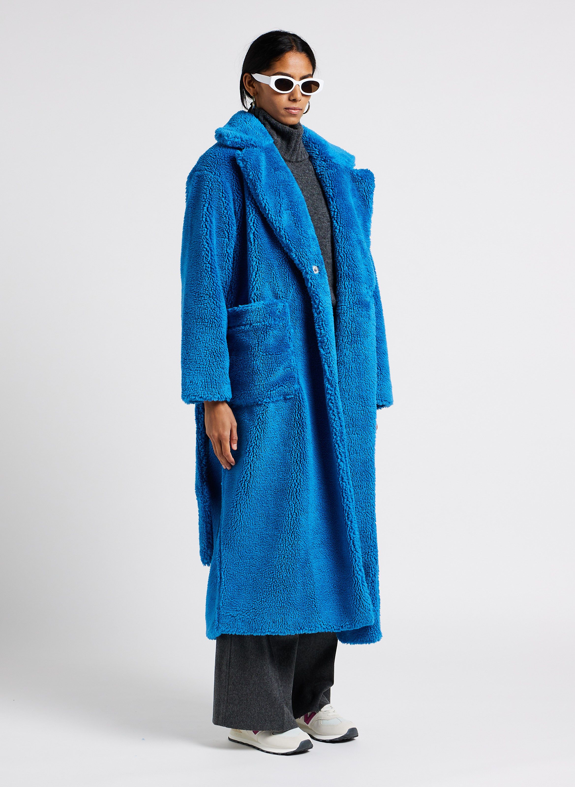 Full length fake store fur coat